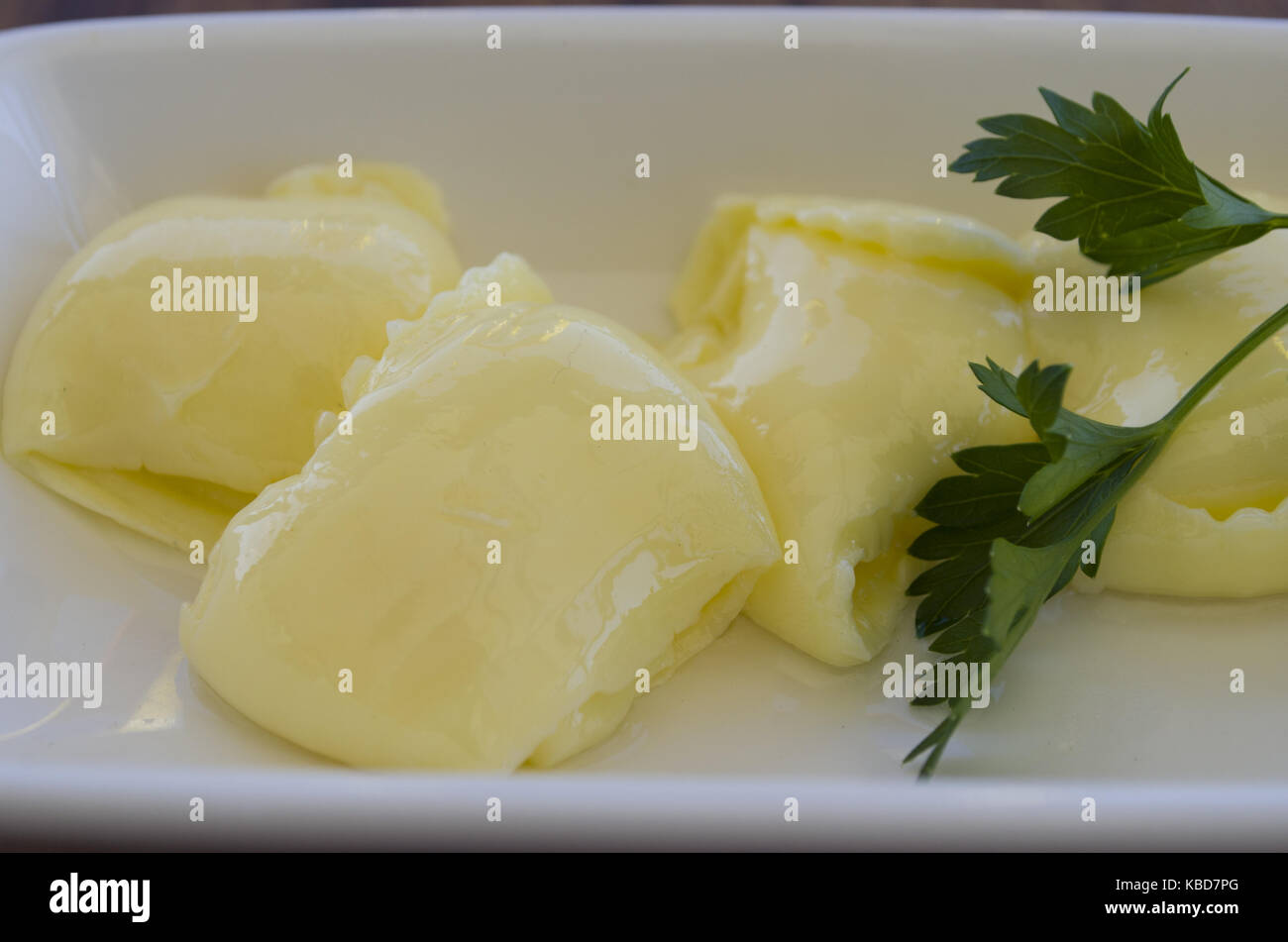 pat of fresh farm butter on a butter dish Stock Photo Alamy
