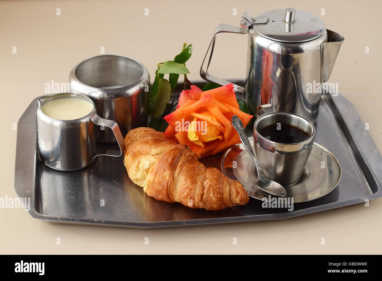 Romantic breakfast in bed. Coffee set, rose, crisp with egg on a silver tray. Healthy concept. Love. Romance Stock Photo