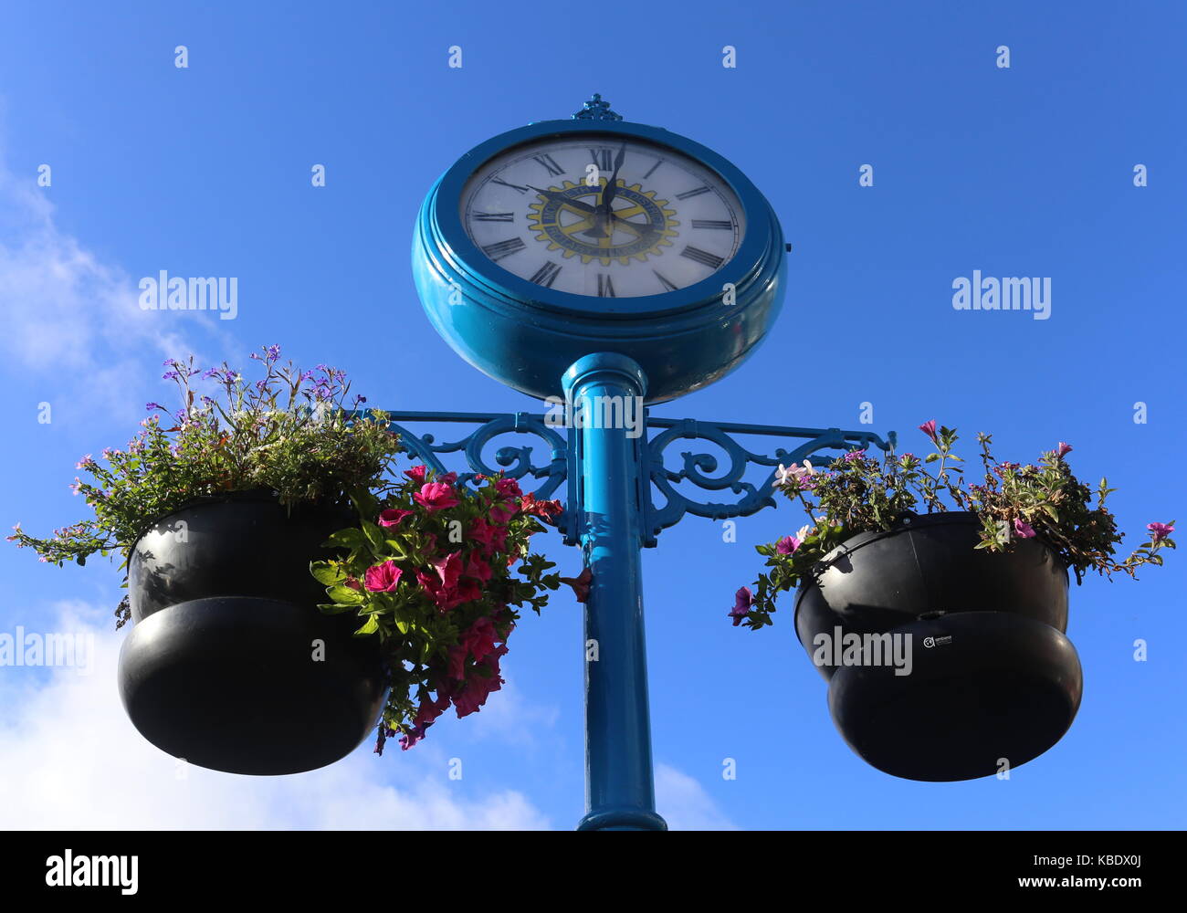 Ornamental clock and hanging baskets Monifieth Angus Scotland September
