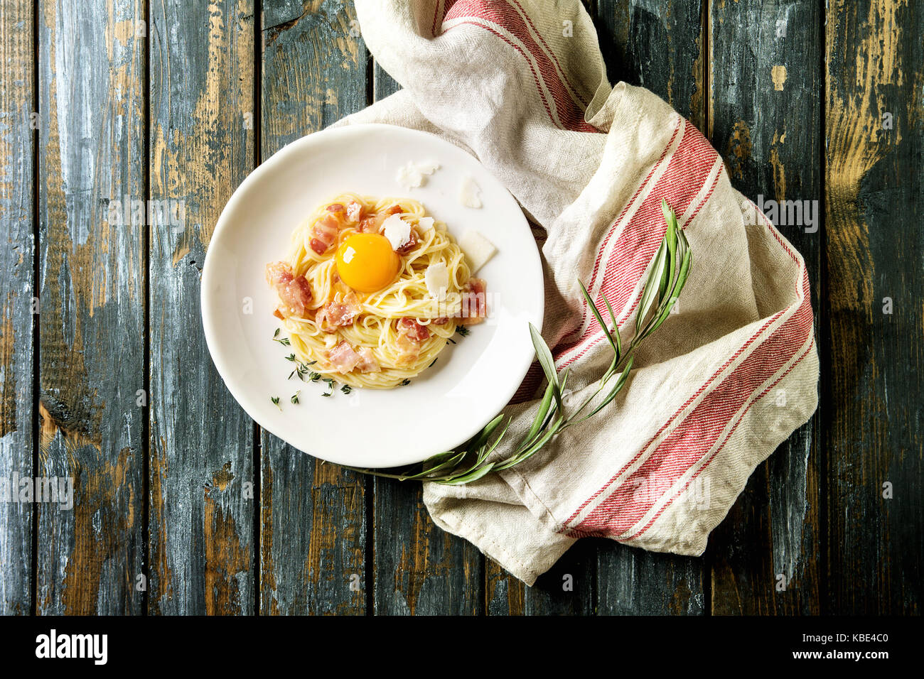 Italian traditional pasta alla carbonara with yolk, pancetta bacon