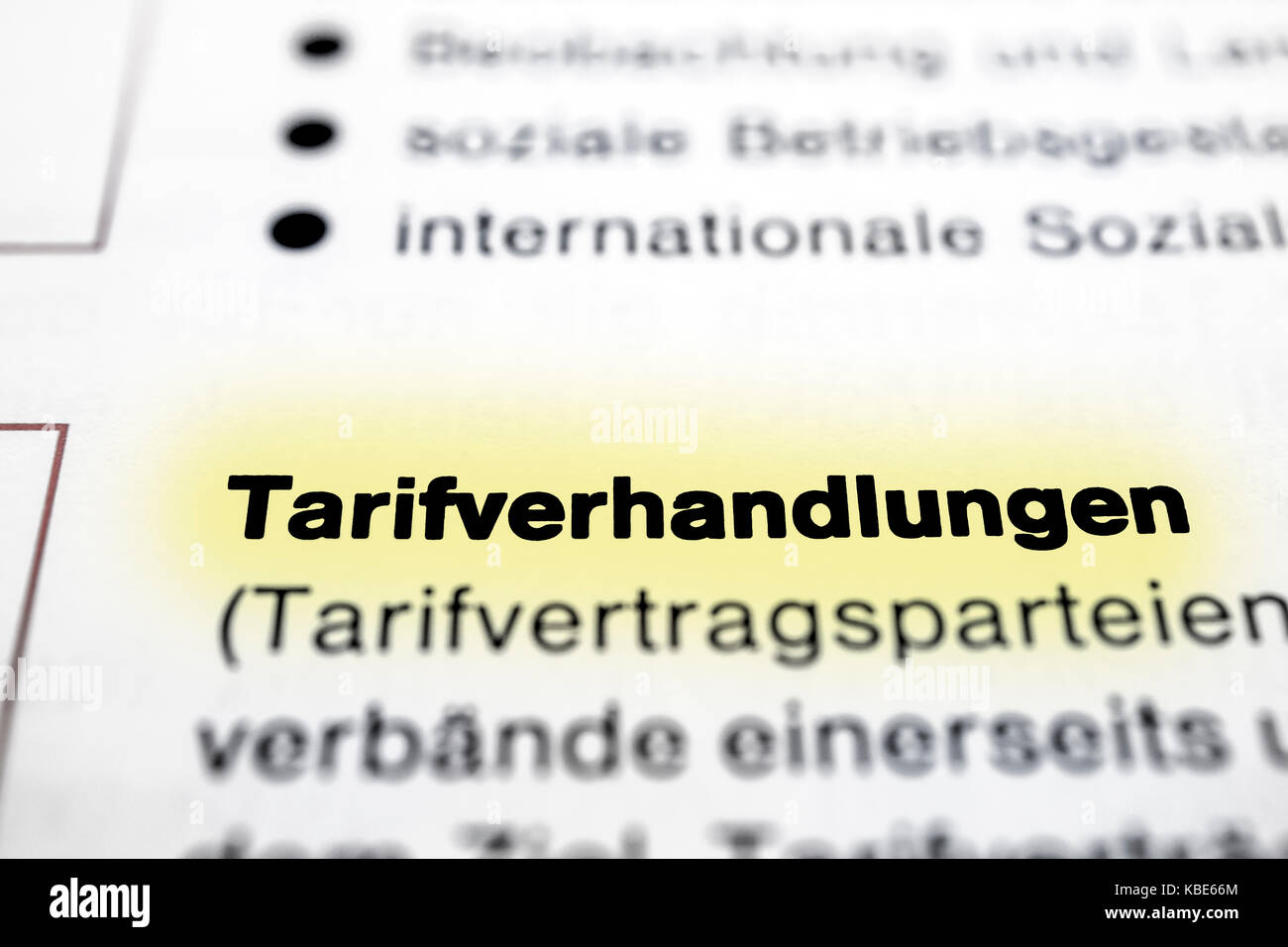 Text on page Collective Negotiations in  ( German - Tarifverhandlungen ) highlight horizontal closeup Stock Photo