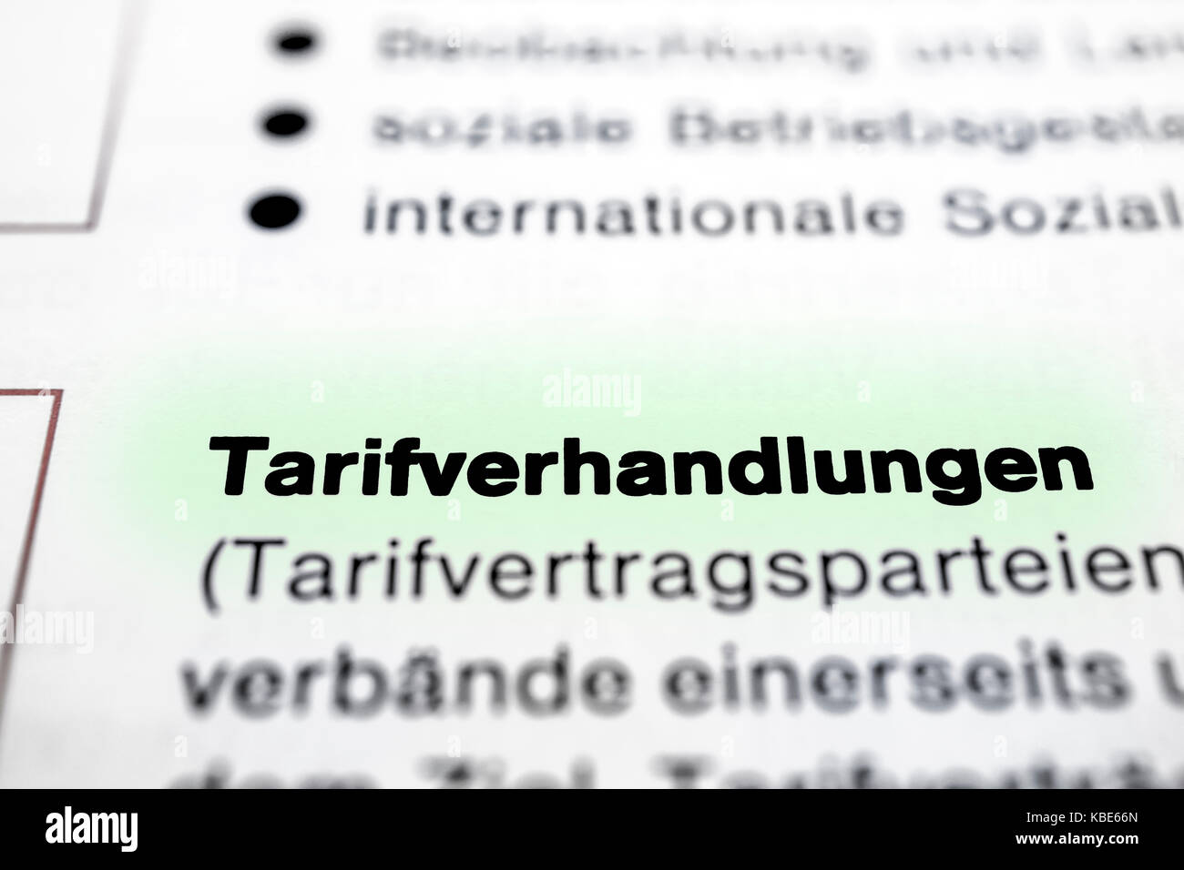 Text on page Collective Negotiations in ( German - Tarifverhandlungen ) highlight horizontal closeup Stock Photo