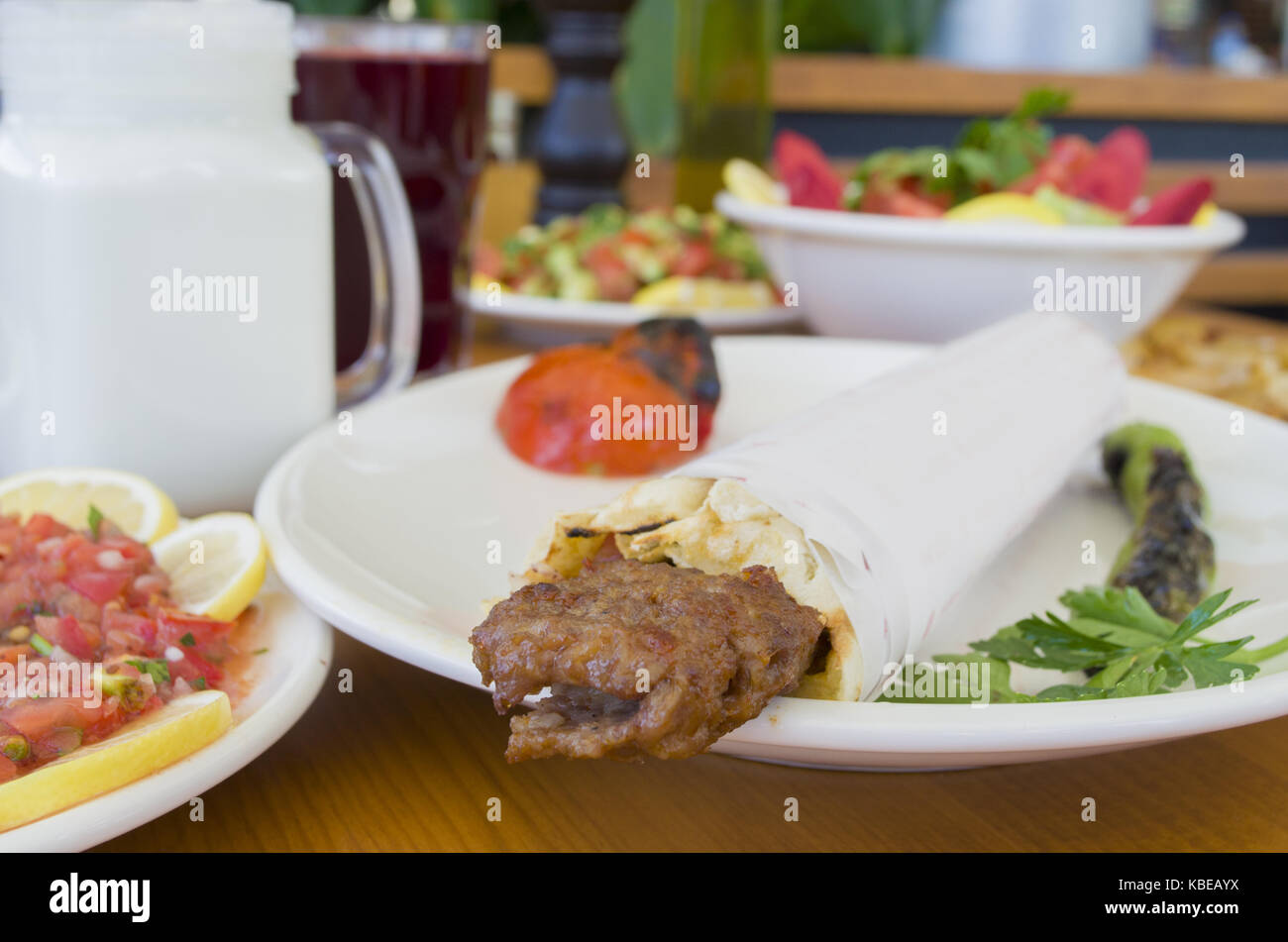 turkish and arabic traditional ramadan adana kebab roll wrap serving