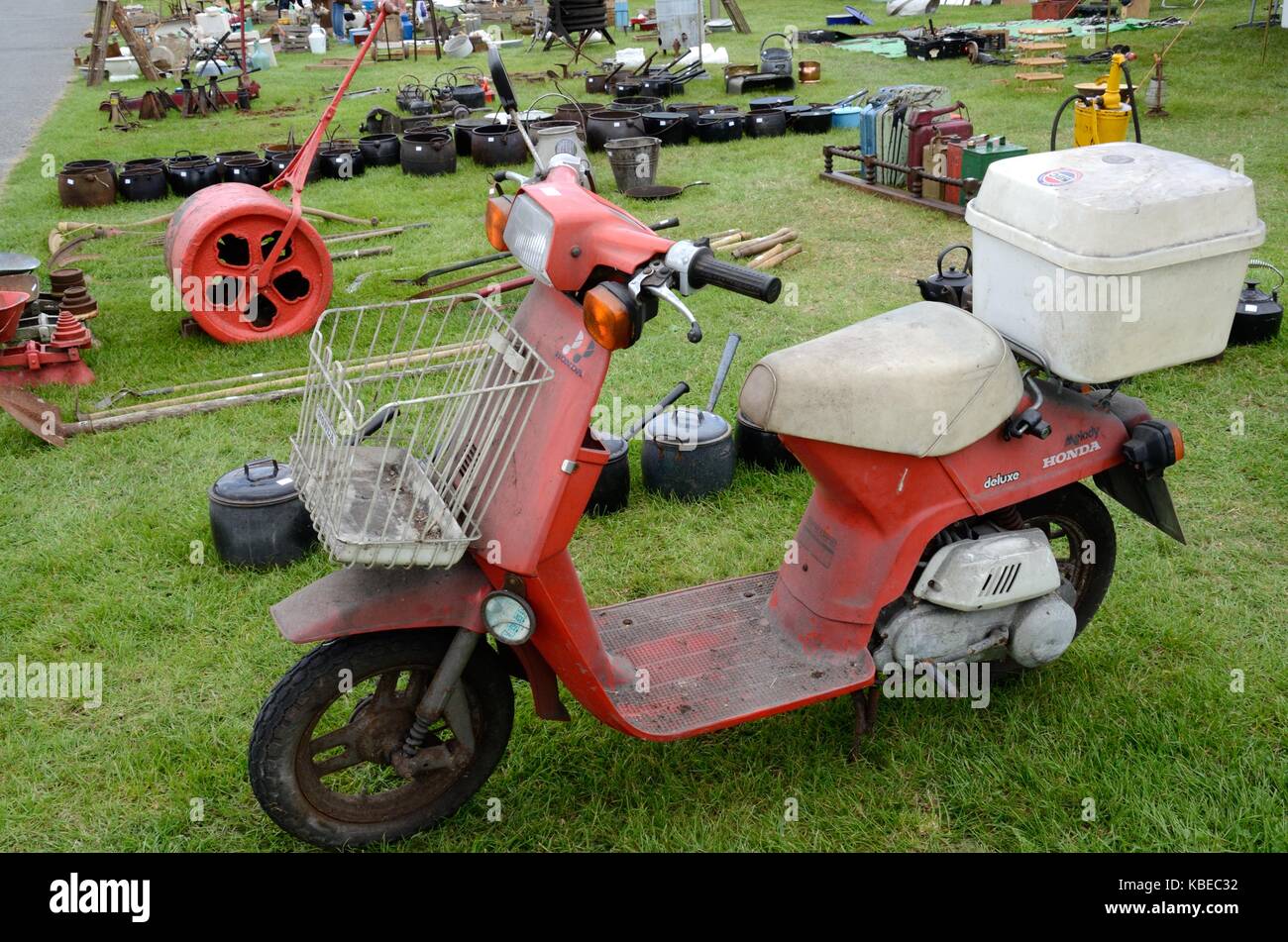 Vintage Honda scooter for sale in a flea market Stock Photo - Alamy