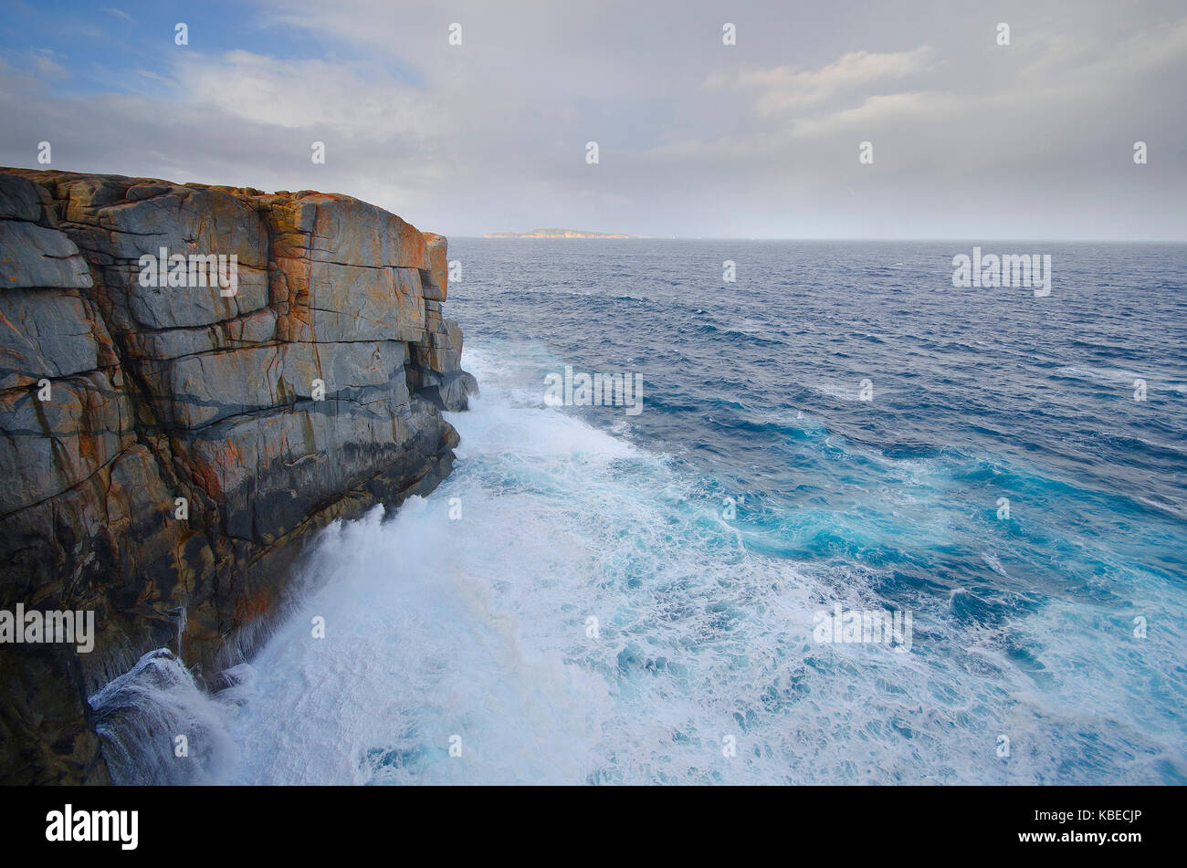 Waves of the Great Southern Ocean crashing against the 25-metre cliffs at the Gap, Torndirrup National Park, Albany, Western Australia, Australia Stock Photo