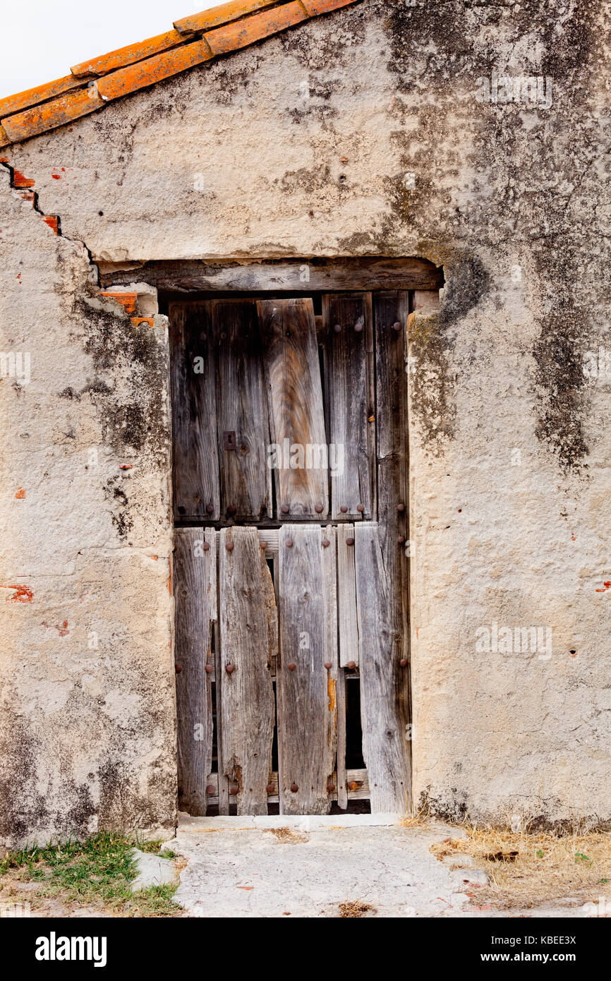 Old wooden door a with rusty lock Stock Photo - Alamy