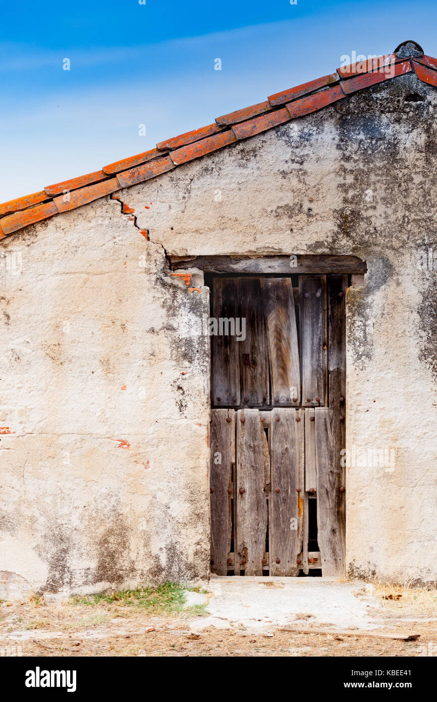 Old wooden door a with rusty lock Stock Photo - Alamy