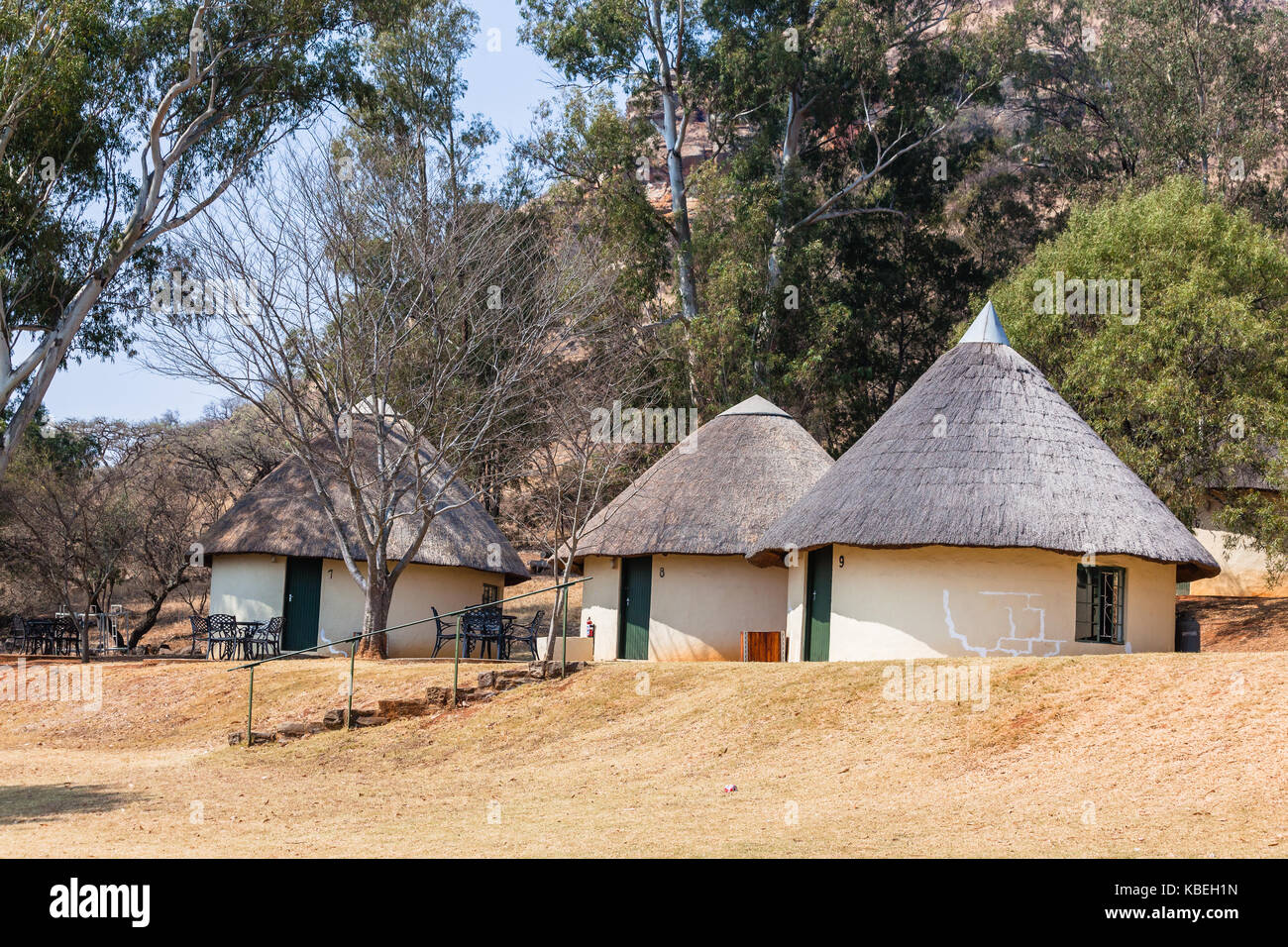 African style thatch grass roofs round bungalow buildings holiday Stock