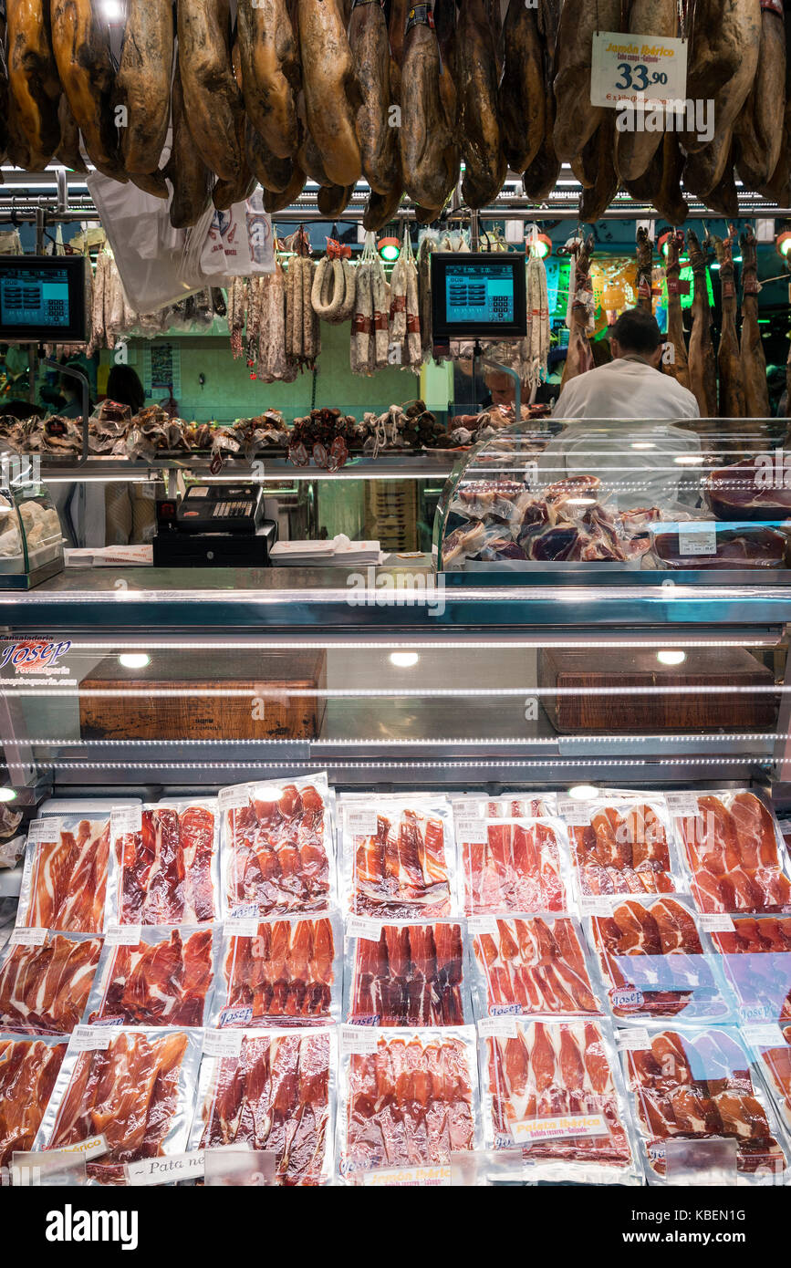 traditional spanish cured meats and sausages on display at la boqueria ...