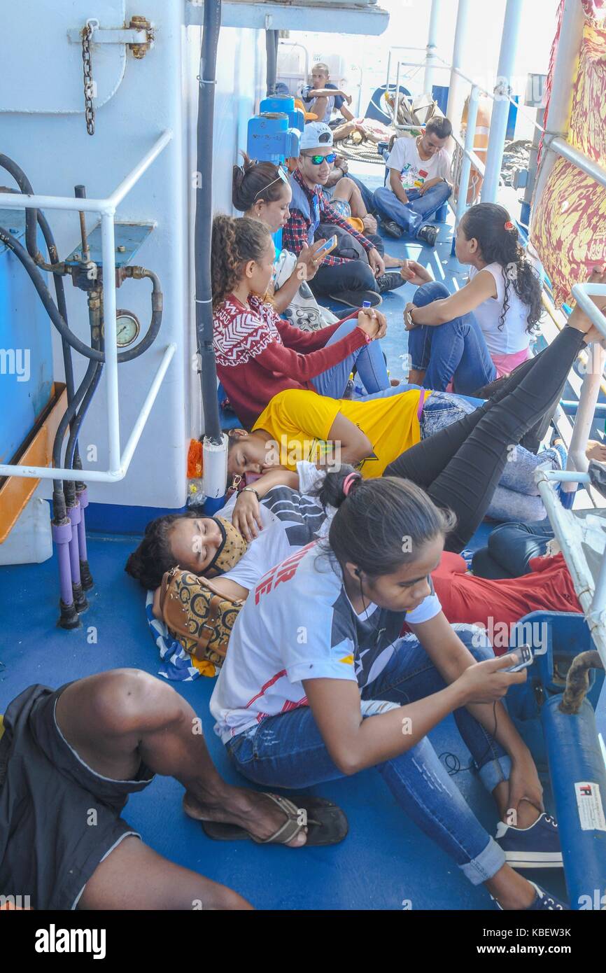 passengers on a ferry from Dili to Atauro, Timor-Leste, Dec. 28, 2016 | usage worldwide Stock Photo
