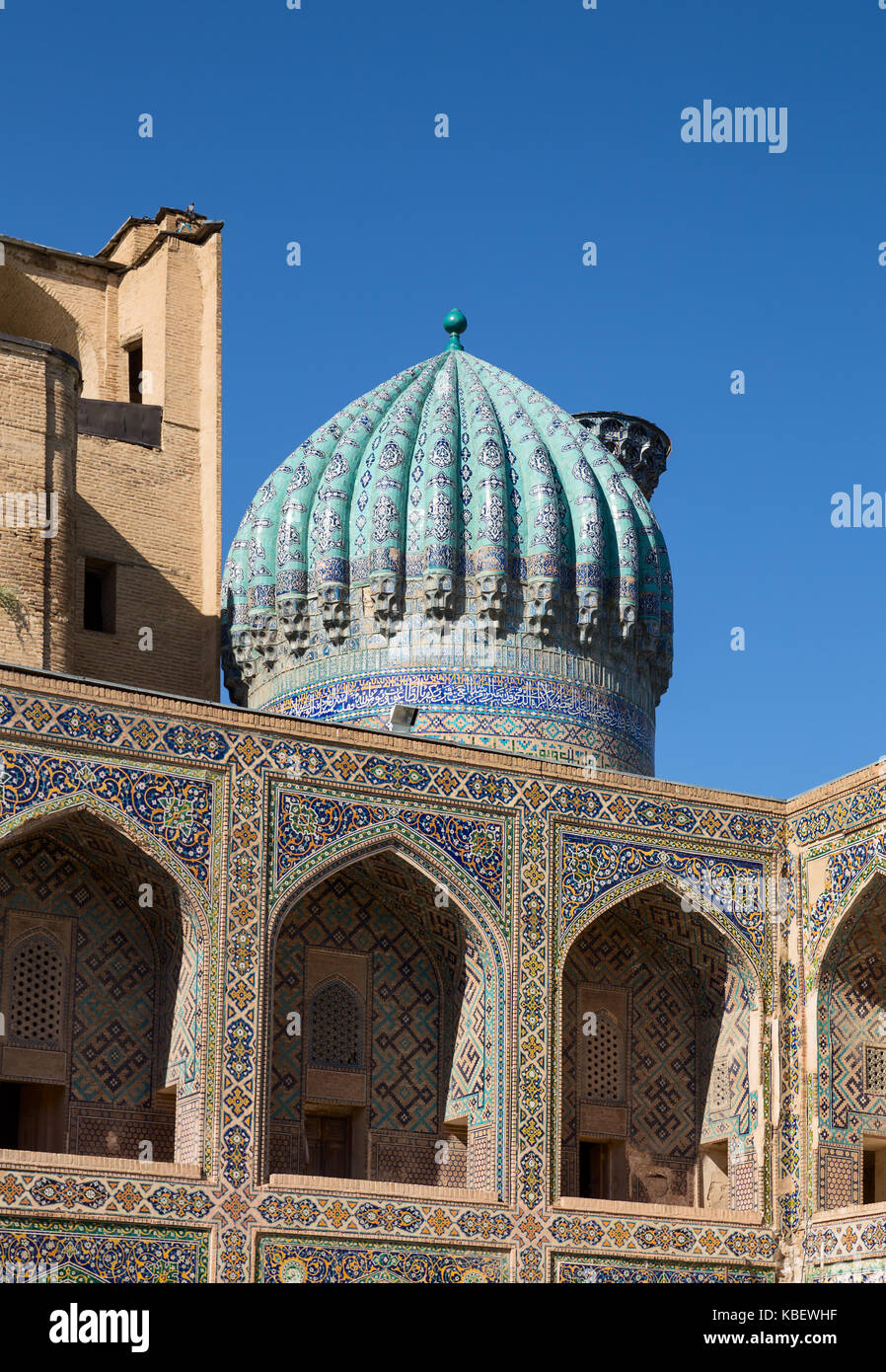 Dome and gallery on the second floor of Madrasah Sher-Dor courtyard. Samarkand, Uzbekistan Stock Photo