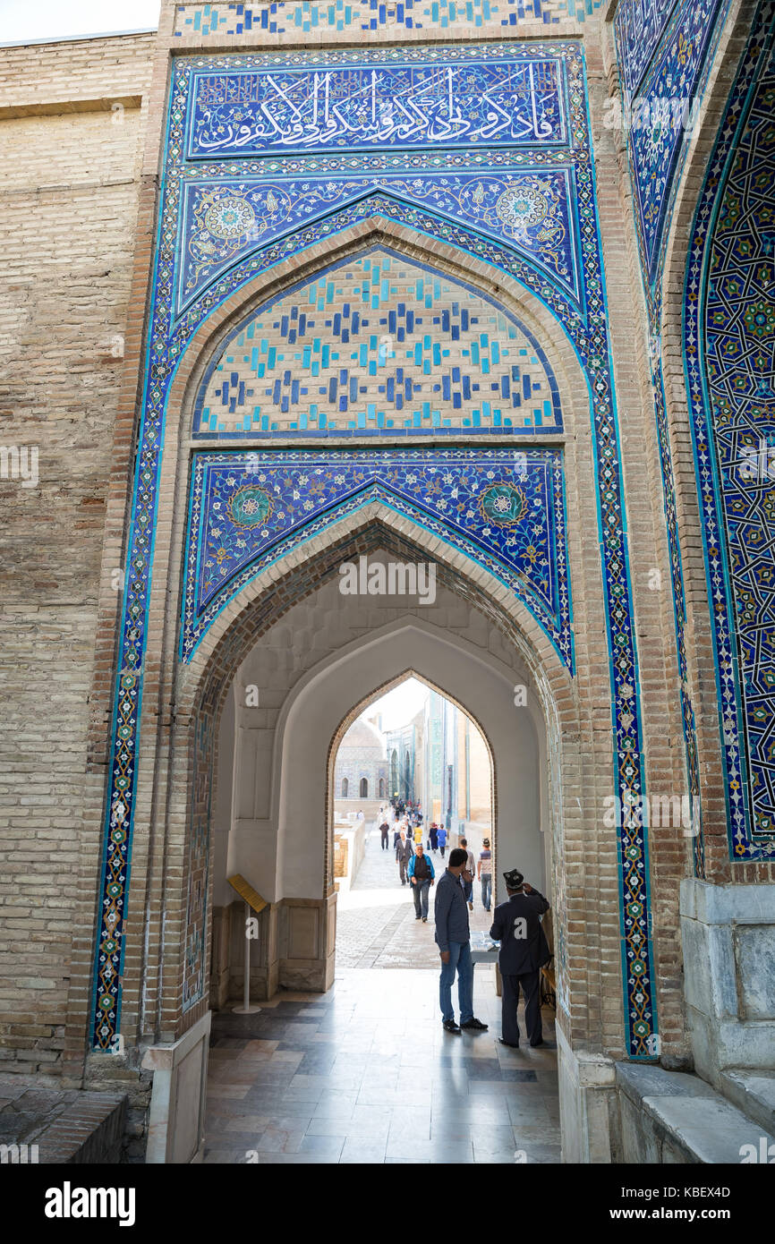 SAMARKAND, UZBEKISTAN - OCTOBER 15, 2016:  People visit the mausoleum complex Shah-I-Zinda Stock Photo