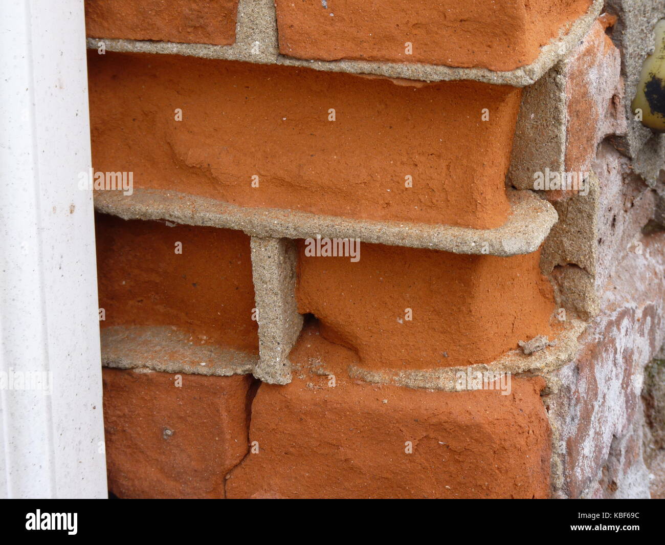 Environmental damage to Brick Walling. Stock Photo