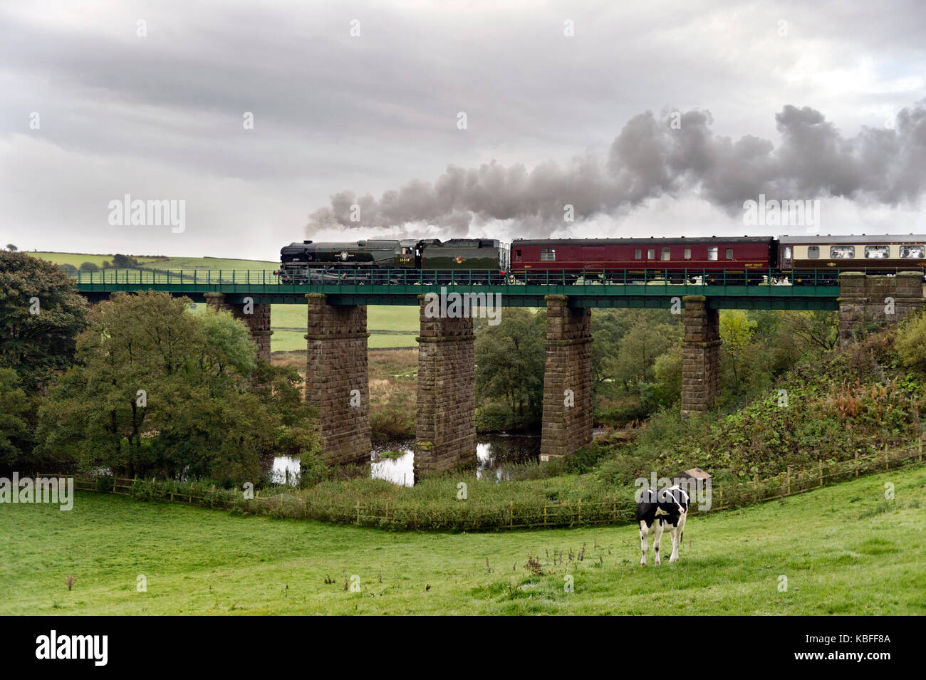 Clapham, North Yorkshire, UK. 30th September, 2017. Steam locomotive 'British India Line' No 35018 makes it's main-line passenger carrying debut, seen here at Clapham Viaduct, North Yorkshire, 30th September. The locomotive, originally recovered from the famous Barry scrapyard, has been undergoing restoration at Carnforth, Lancashire. Today, hauling the Lune Rivers Trust excursion, is the first occasion it has hauled a passenger carrying service on the main line and the first time it has been seen in its finished livery. Credit: John Bentley/Alamy Live News Stock Photo
