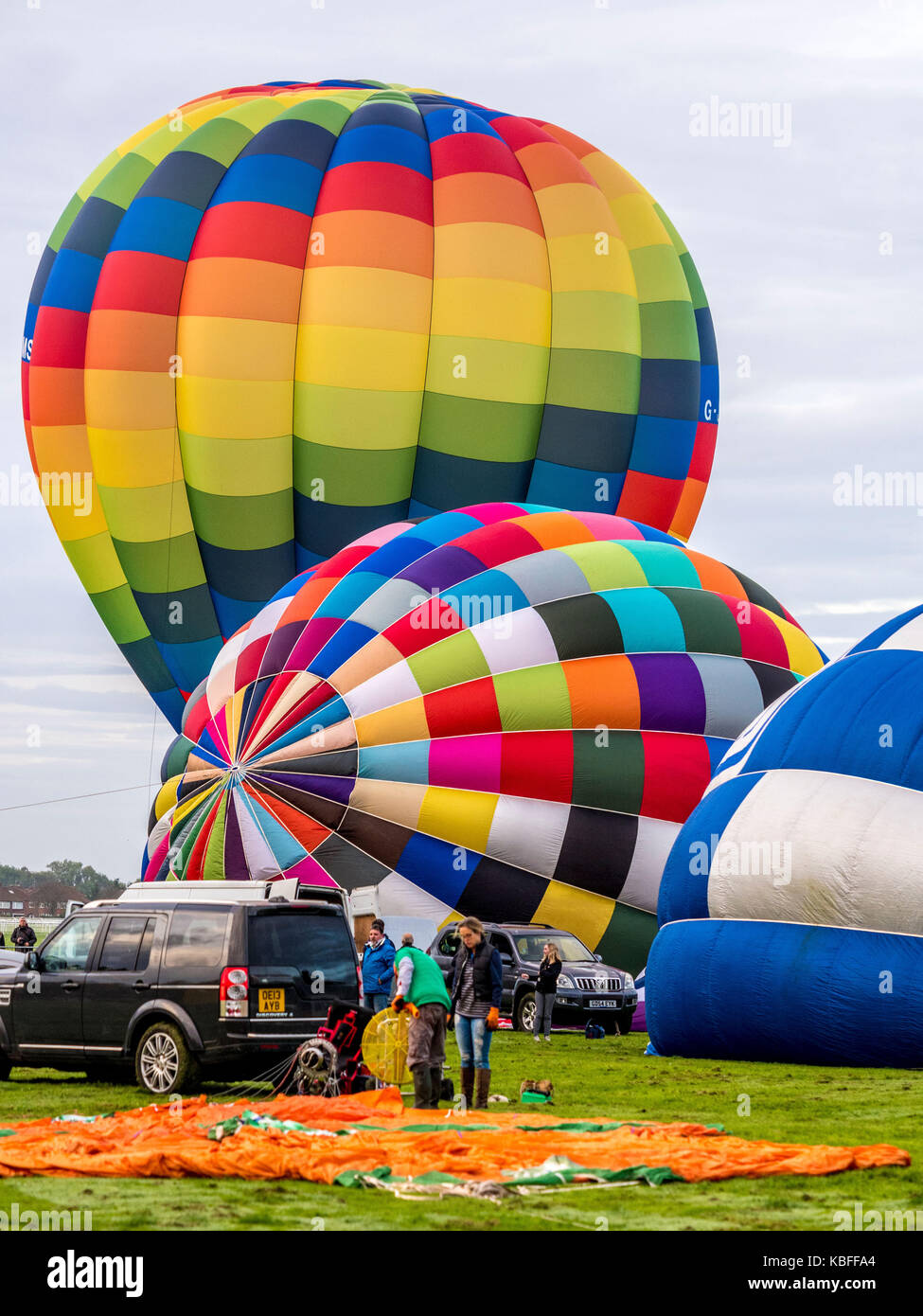 York, UK. 30th September, 2017. A mass balloon launch took place at sunrise from York Knavesmire as part of the first ever York Balloon Fiesta. Over 30 balloons took to the skies watched by hundreds of onlookers. The launch is part of a three day event which runs until Sunday the 1st of October. Photo Bailey-Cooper Photography/Alamy Live News Stock Photo