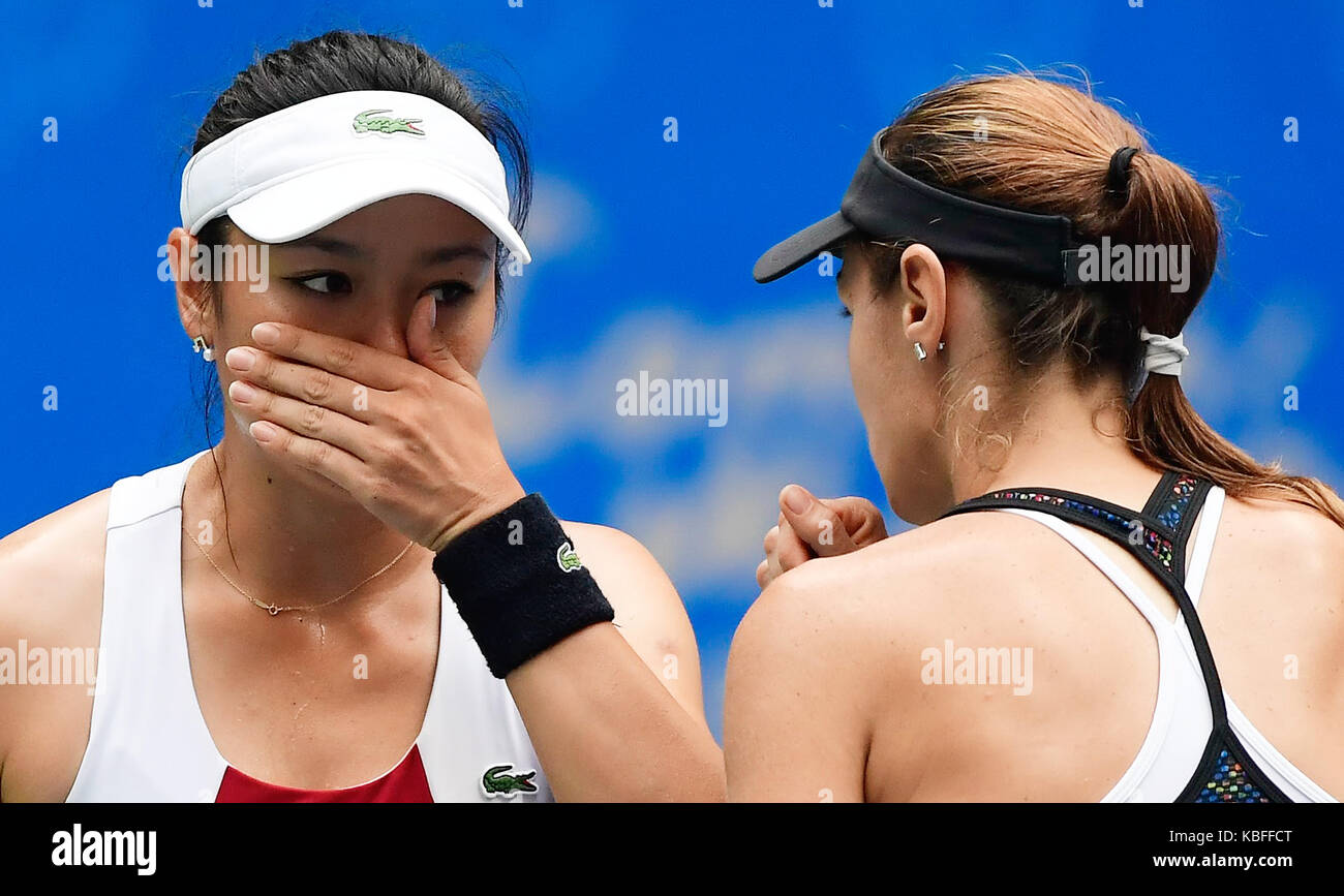 Wuhan, China. 30th September, 2017. Martina Hingis of Switzerland and