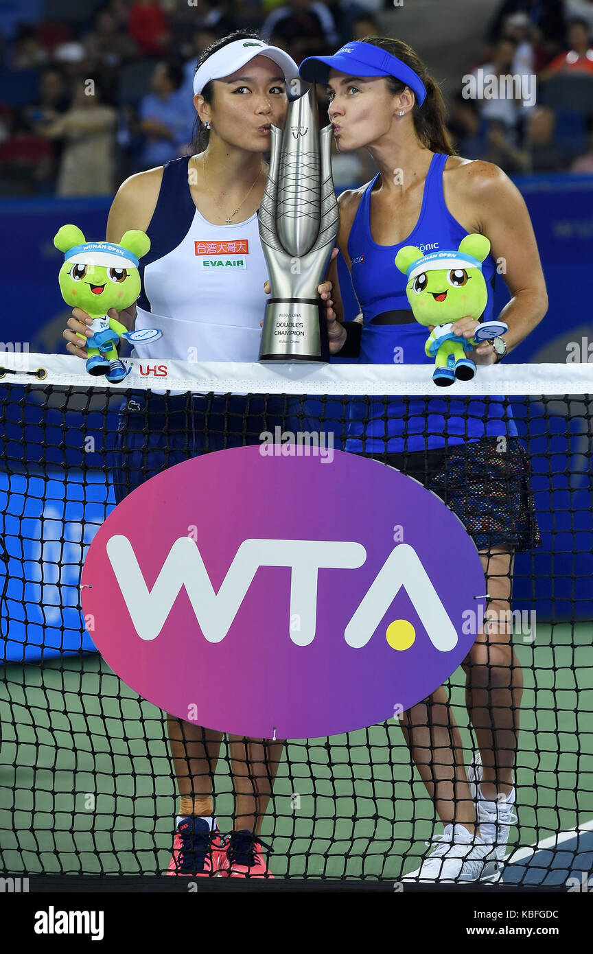 Wuhan, China. 30th September, 2017. Martina Hingis (R) of Switzerland