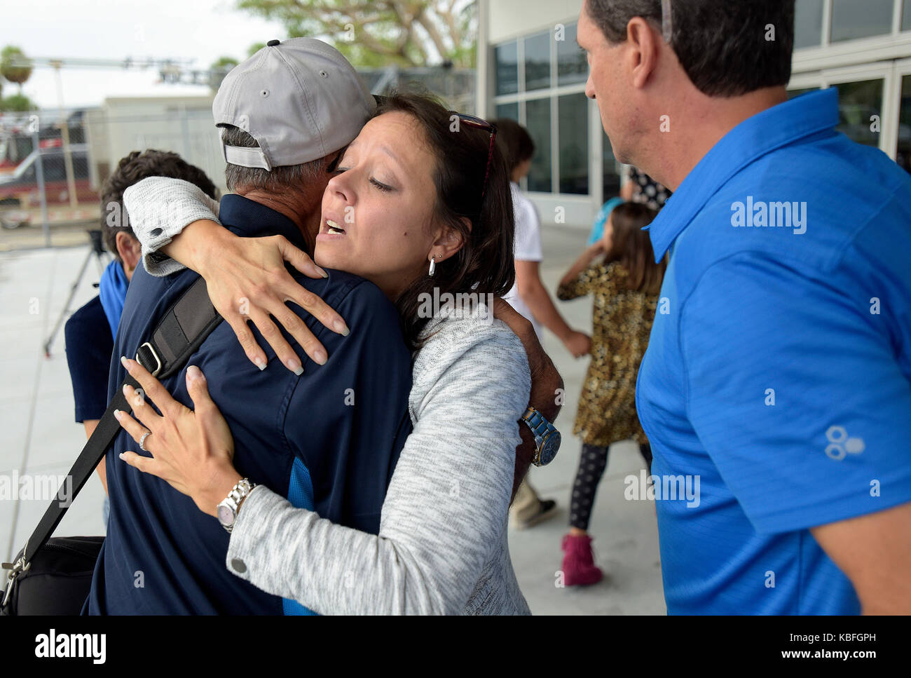 Fort Lauderdale, FL, USA. 29th Sep, 2017. Enid Acosta hugs her father Hector Acosta after he arrived at Fort Lauderdale/Hollywood International Airport, Friday, September 29, 2017, on an IBC Airways flight that evacuated seniors from Puerto Rico. The flight was provided by a local nonprofit organization, the Pathfinders Task Force, through a program called Eagles Wings. Photo by Michael Laughlin, South Florida Sun Sentinel Credit: Sun-Sentinel/ZUMA Wire/Alamy Live News Stock Photo