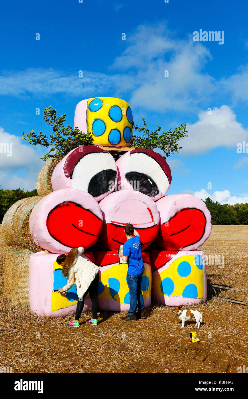 Ayrshire, UK. 30th September, 2017. The Scottish Association of Young Farmers is holding the annual 'Bale Art' competition when members of the 'Young Farmers'  across Scotland decorate hay and sillage bale to add colour and humour to the countryside.The West of Scotland District have chosen to put their artwork next to the A77 motorway near Symington and hope that LORRAINE KELLY (TV personality) who is this years judge will pick theirs as best. Credit: Findlay/Alamy Live News Stock Photo