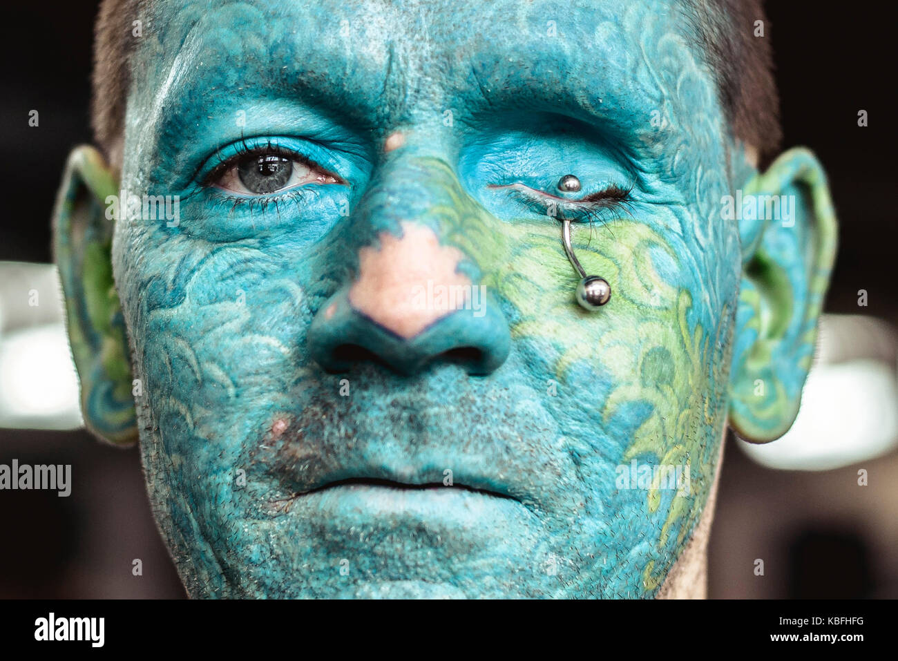 Barcelona, Spain. 30 September, 2017:  A tattoo enthusiast shows his full-face tattoo and eye piercing at the 20th International Barcelona Tattoo Expo. Credit: Matthias Oesterle/Alamy Live News Stock Photo