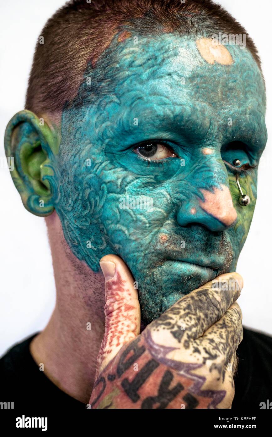 Barcelona, Spain. 30 September, 2017:  A tattoo enthusiast shows his full-face tattoo and eye piercing at the 20th International Barcelona Tattoo Expo. Credit: Matthias Oesterle/Alamy Live News Stock Photo