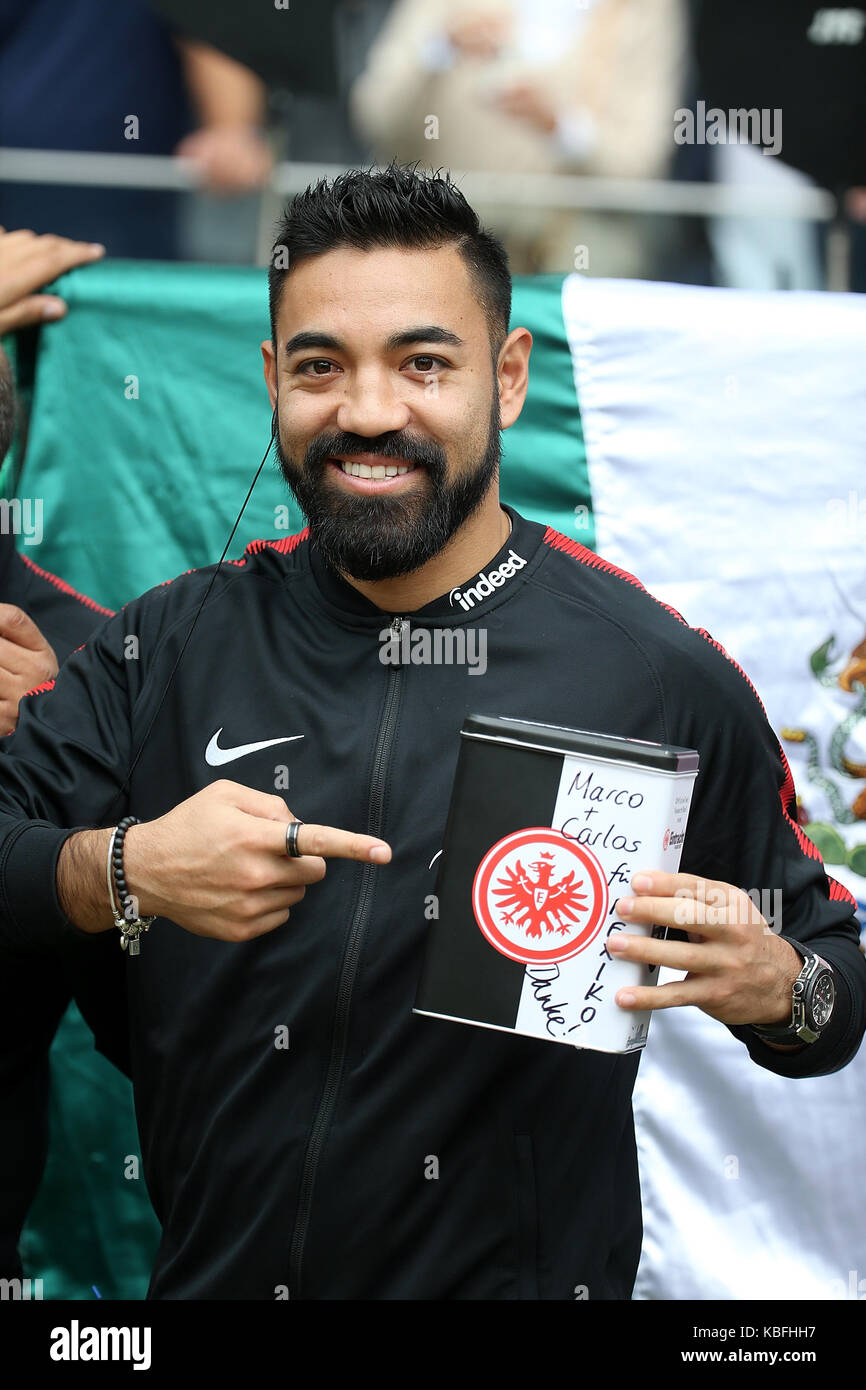 Frankfurt, Germany. 30th Sep, 2017. Frankfurt's Marco Fabian collects donations for earthquake victims in his home country Mexico before the German Bundesliga match between Eintrach Frankfurt and VfB Stuttgart in Frankfurt, Germany, 30 September 2017. (EMBARGO CONDITIONS - ATTENTION: Due to the accreditation guidelines, the DFL only permits the publication and utilisation of up to 15 pictures per match on the internet and in online media during the match.) Credit: Hasan Bratic/dpa/Alamy Live News Stock Photo