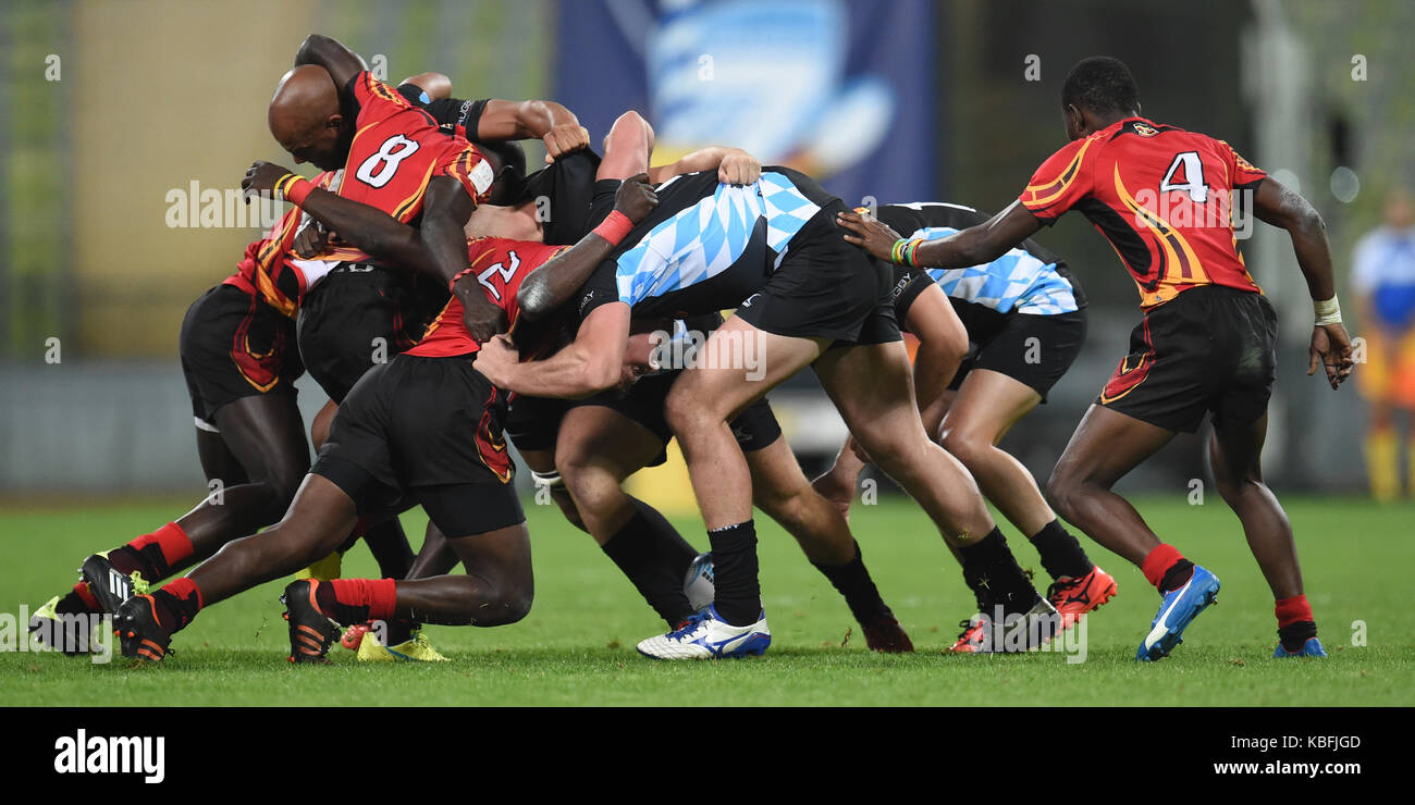 Munich, Germany. 29th Sep, 2017. Four players from each team in a scrum