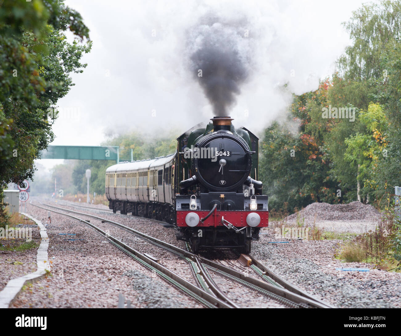 Wrexham, North Wales, UK. 30th September, 2017. Steam locomotive 5043 Earl of Mount Edgcumbe storms along the newly doubled section of line between Chester and Wrexham General hauling a charter train back to Birmingham. Credit: Charles Allen/Alamy Live News Stock Photo