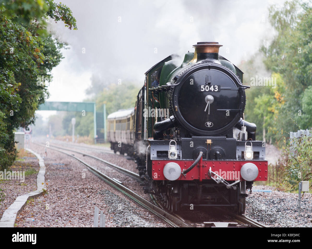 Wrexham, North Wales, UK. 30th September, 2017. Steam locomotive 5043 Earl of Mount Edgcumbe storms along the newly doubled section of line between Chester and Wrexham General hauling a charter train back to Birmingham. Credit: Charles Allen/Alamy Live News Stock Photo