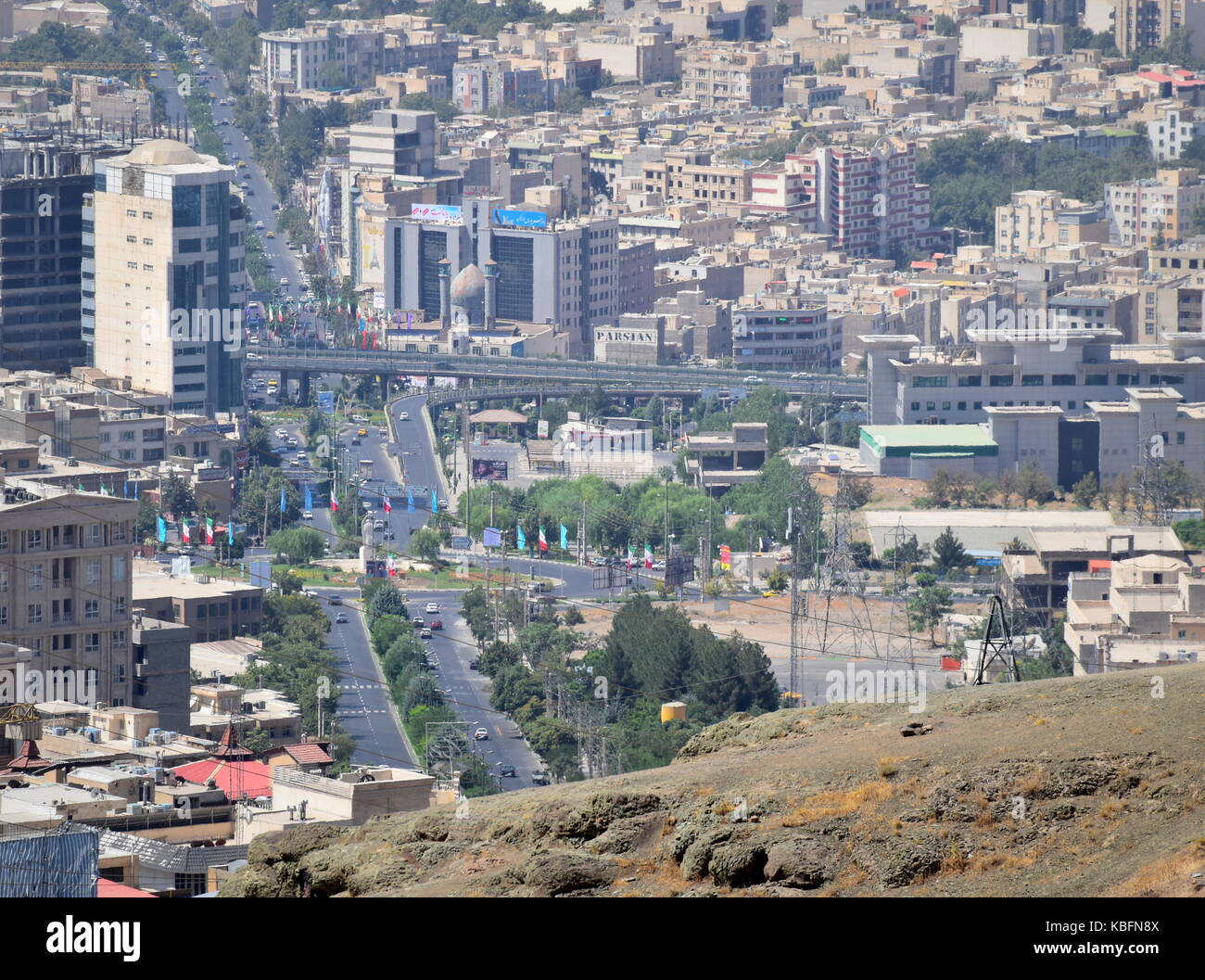 Iran city skyline from the mountains - Urban growth and development in Karaj near Tehran Stock Photo