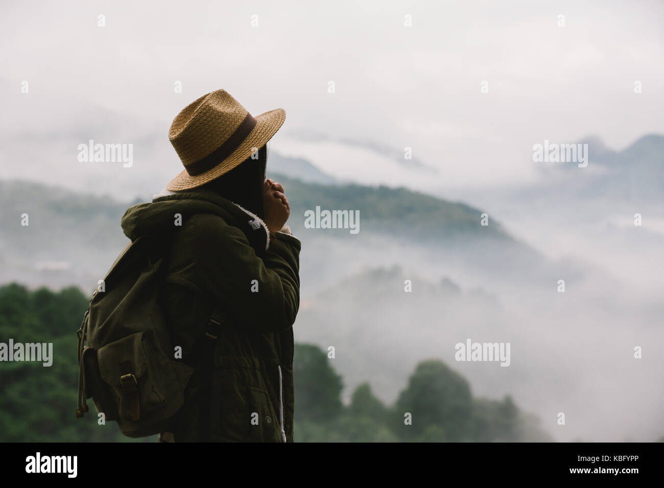Happy woman tourist to travel in wild trip  hiking during vacation.Travel concept. Stock Photo
