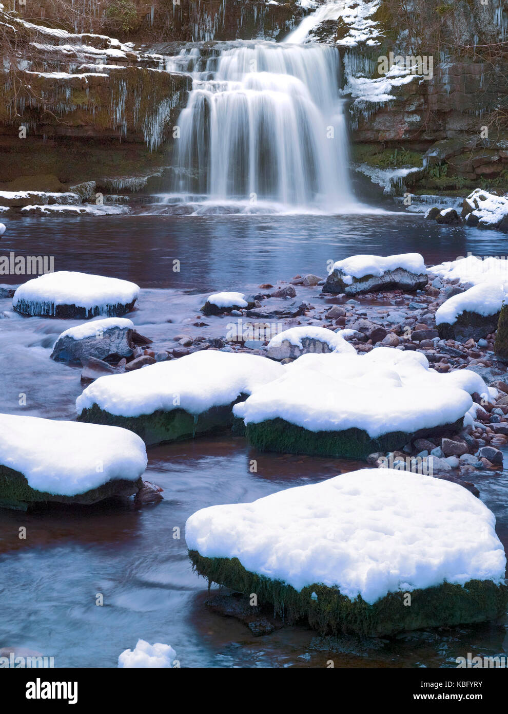 A winter view of West Burton Falls, in the Yorkshire Dales,after a heavy fall of snow Stock Photo