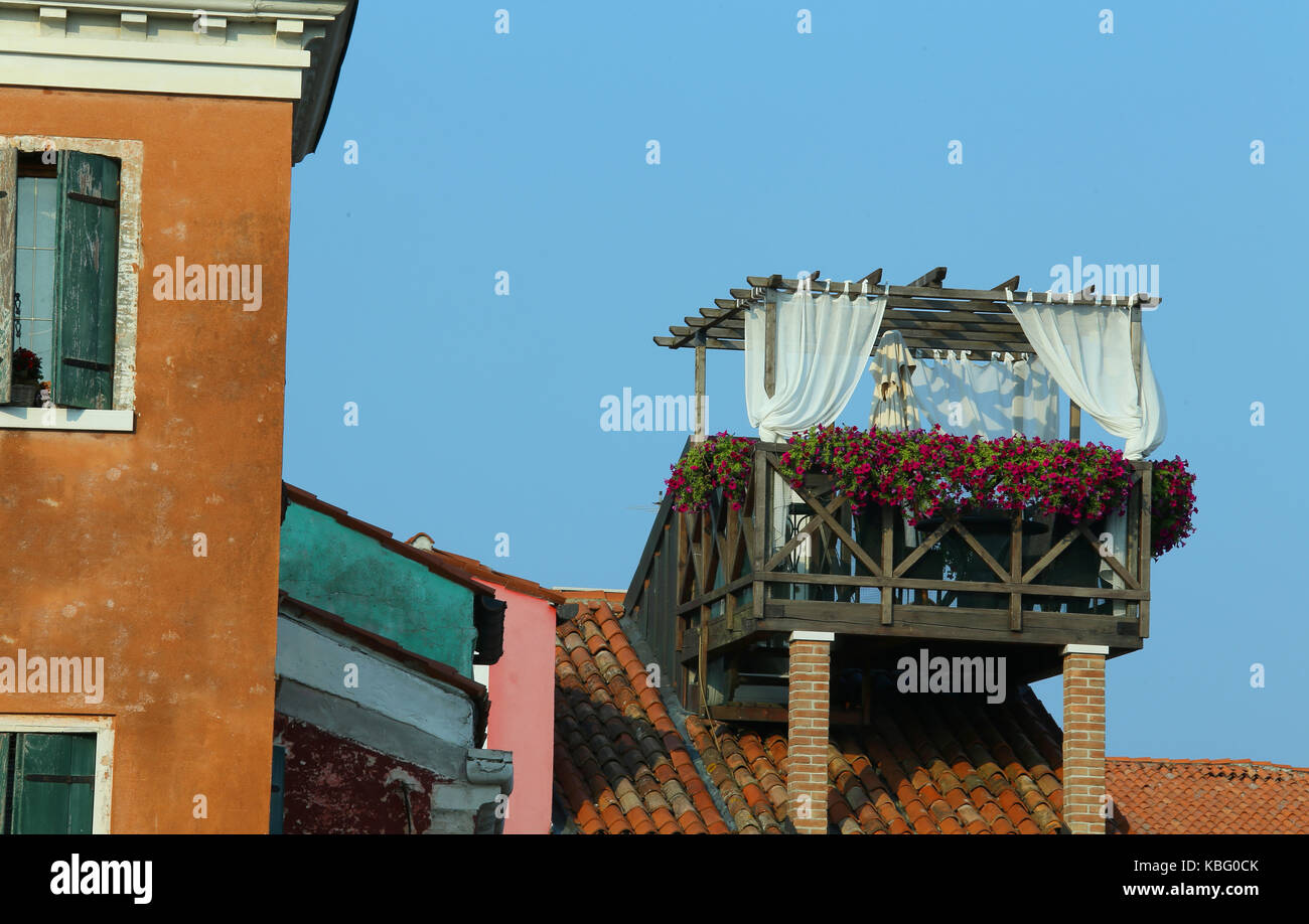 roof terrace also called altana in italian language above the roof of the Venetian house in Northen Italy Stock Photo