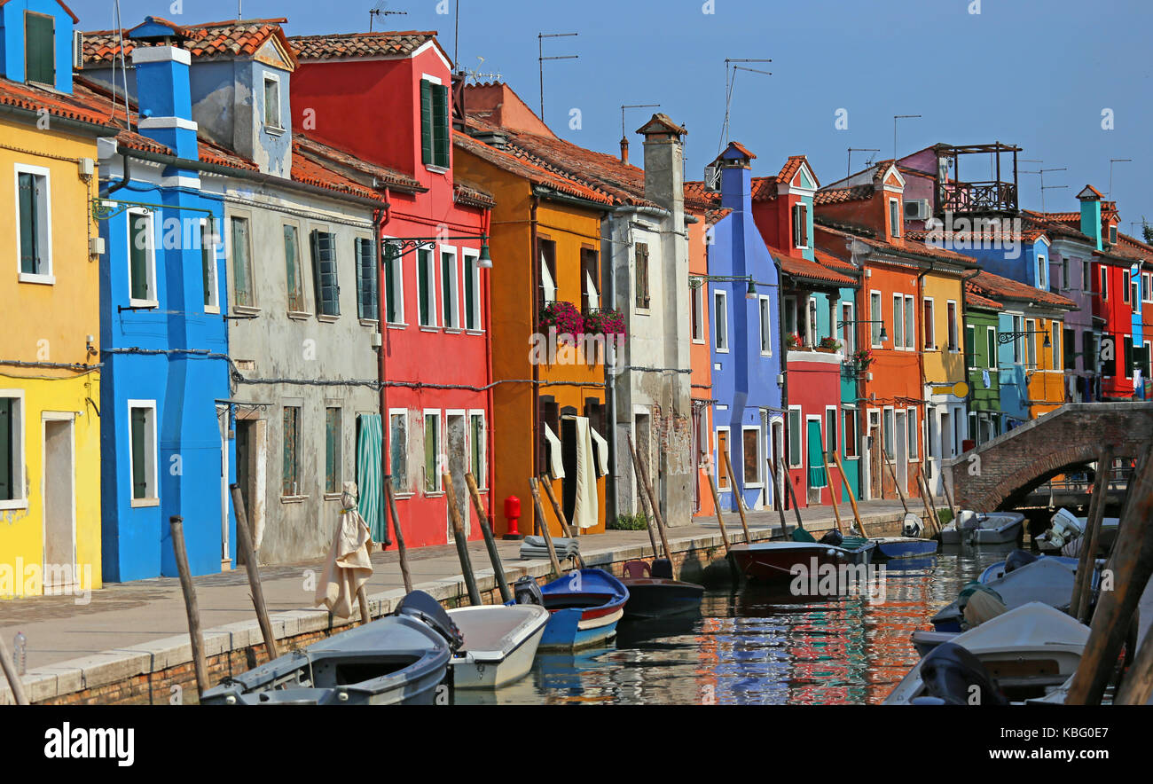 vibrant very colorful houses on the island of Burano in Venice in northern italy Stock Photo