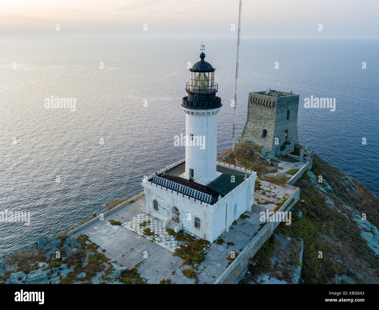 Aerial view of the Lighthouse and Tower on the island of Giraglia, the northernmost point of the Cap Corse peninsula. Corsica France Stock Photo