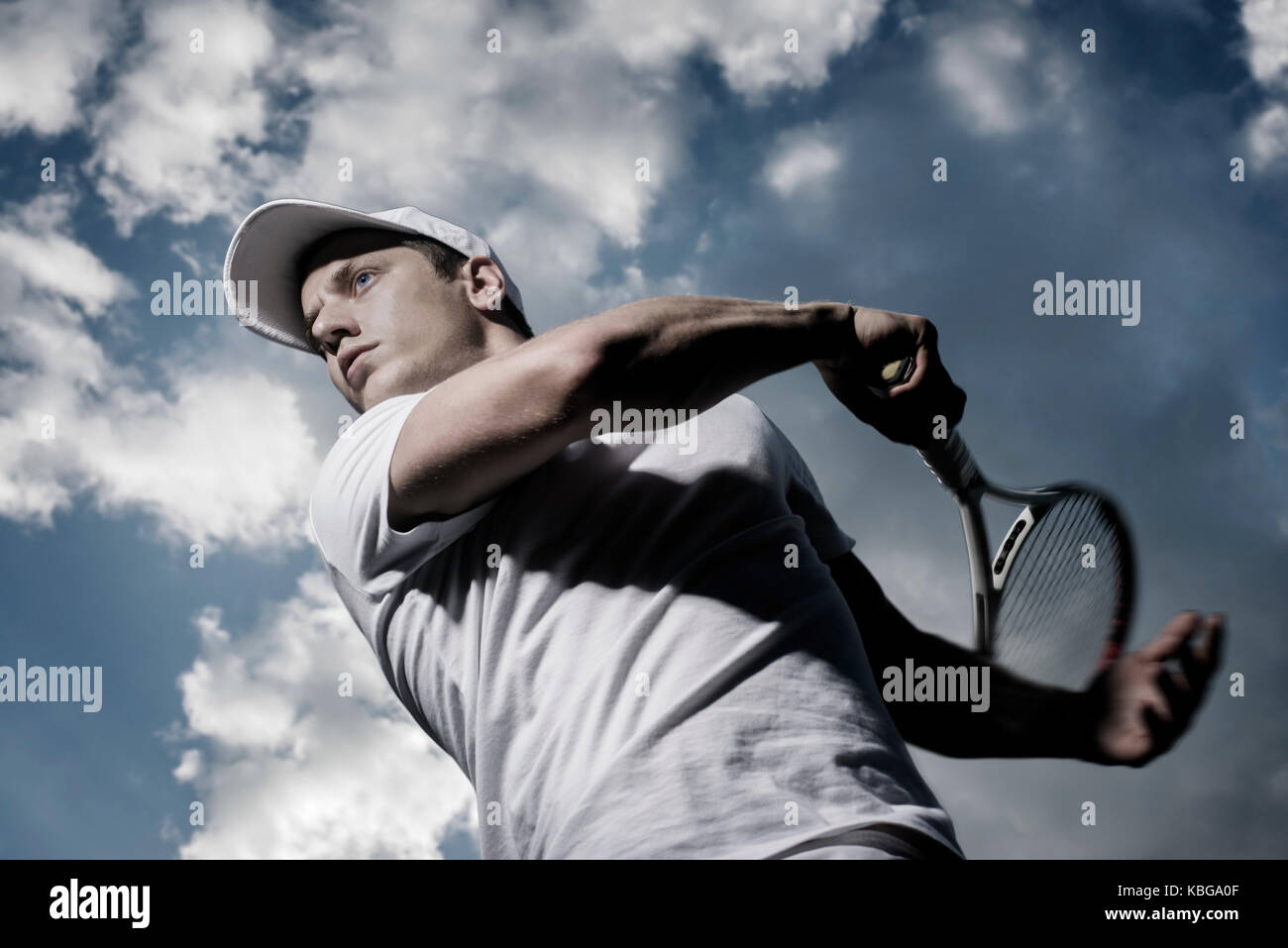 male tennis player in action, motion blurs Stock Photo