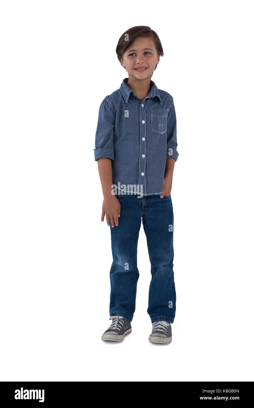 Portrait of boy posing against white background Stock Photo - Alamy