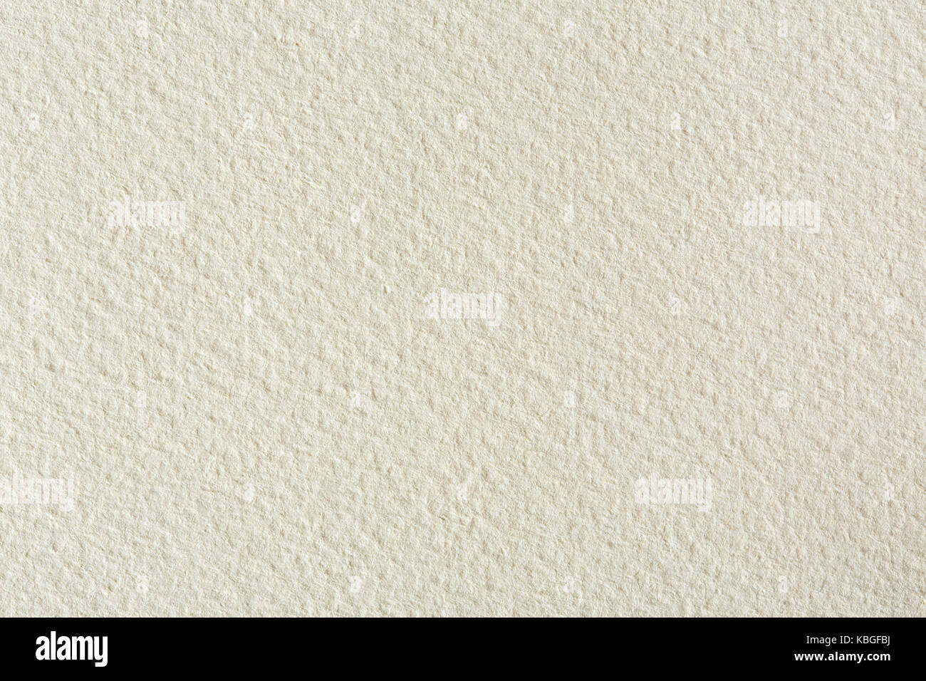 Water-colour paper texture background in light beige tone. Stock