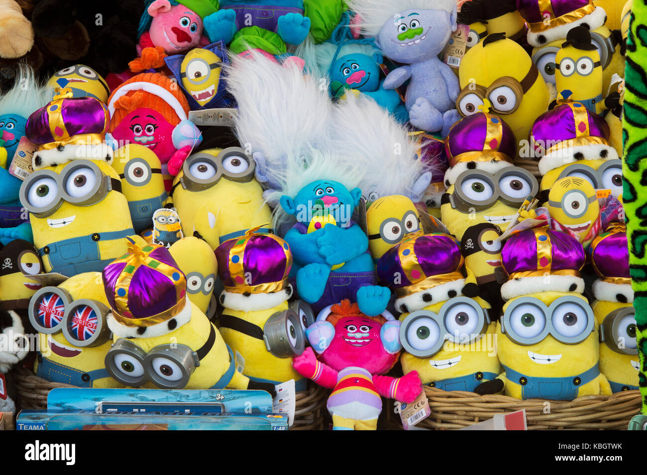 Minions and Trolls toys for sale at an autumn festival. UK Stock Photo