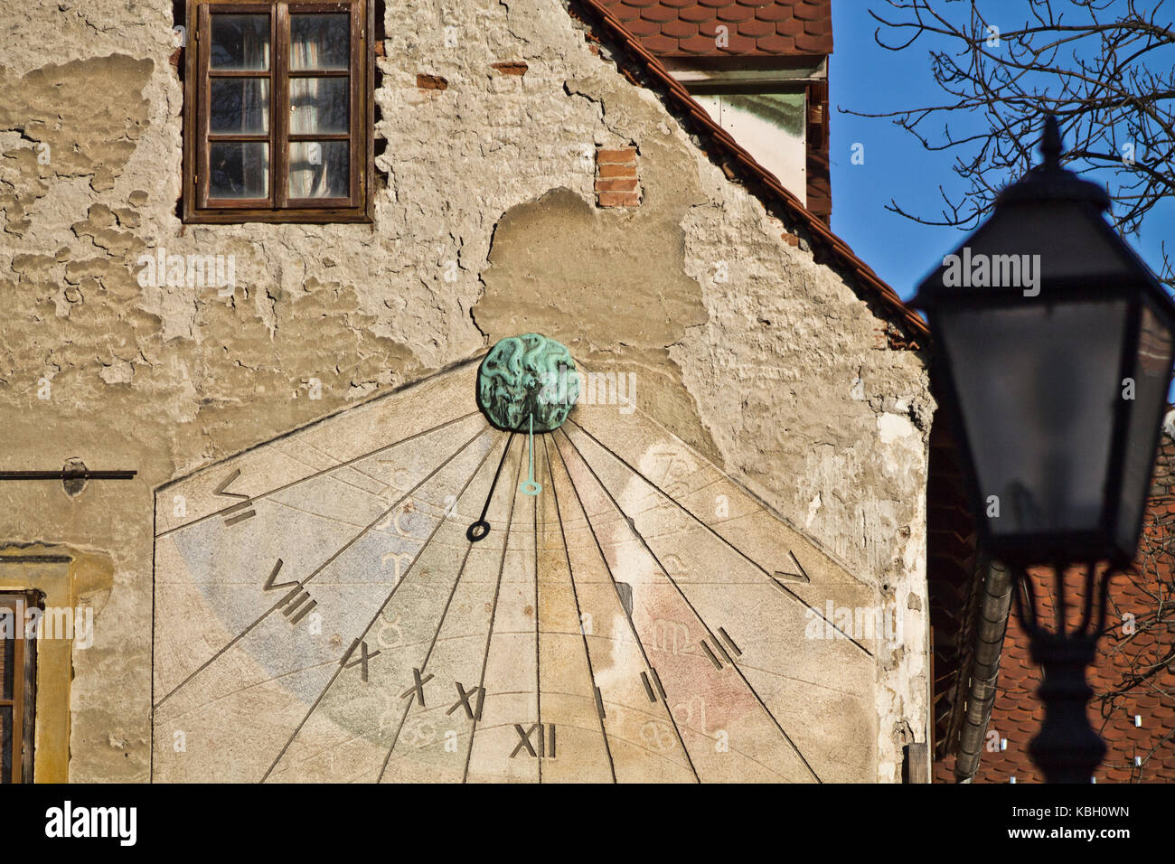 Vintage sun clock on a wall in Zagreb Stock Photo Alamy