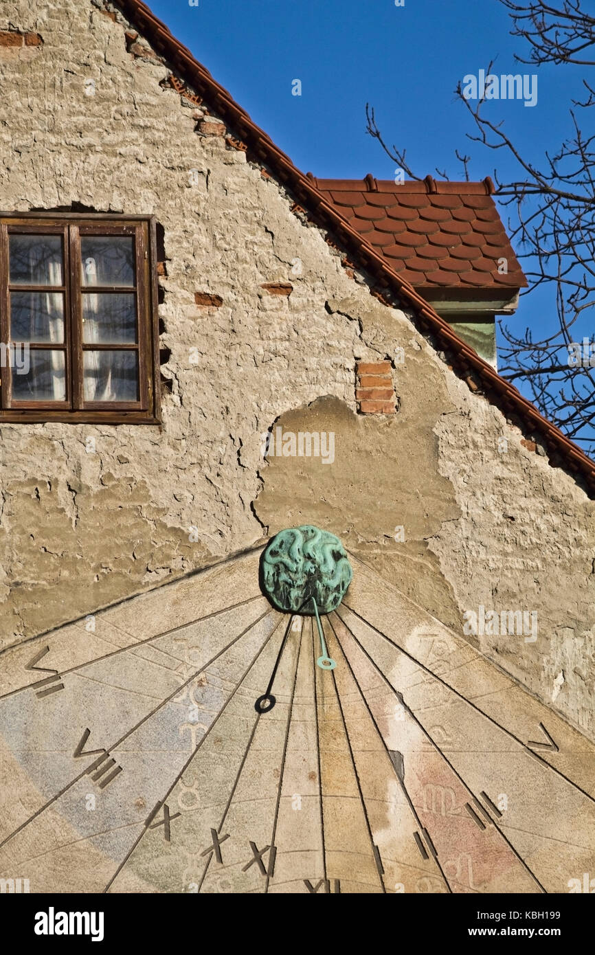 Vintage sun clock on a wall in Zagreb Stock Photo Alamy