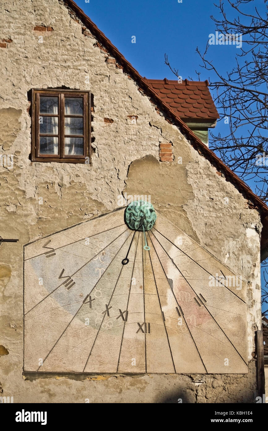 Vintage sun clock on a wall in Zagreb Stock Photo Alamy
