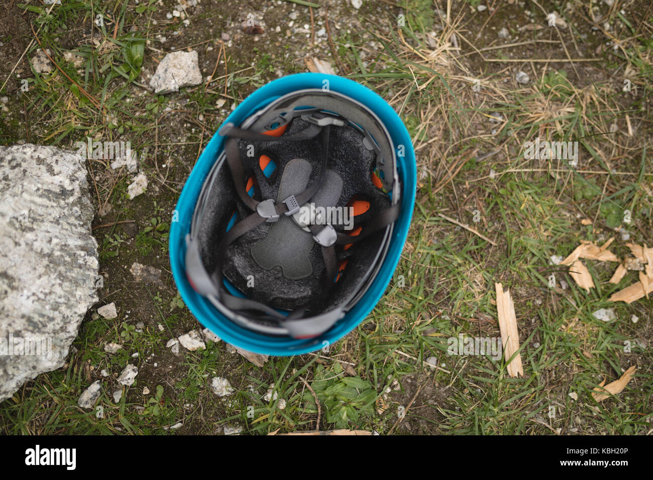 Overhead of protective helmet on grass Stock Photo - Alamy