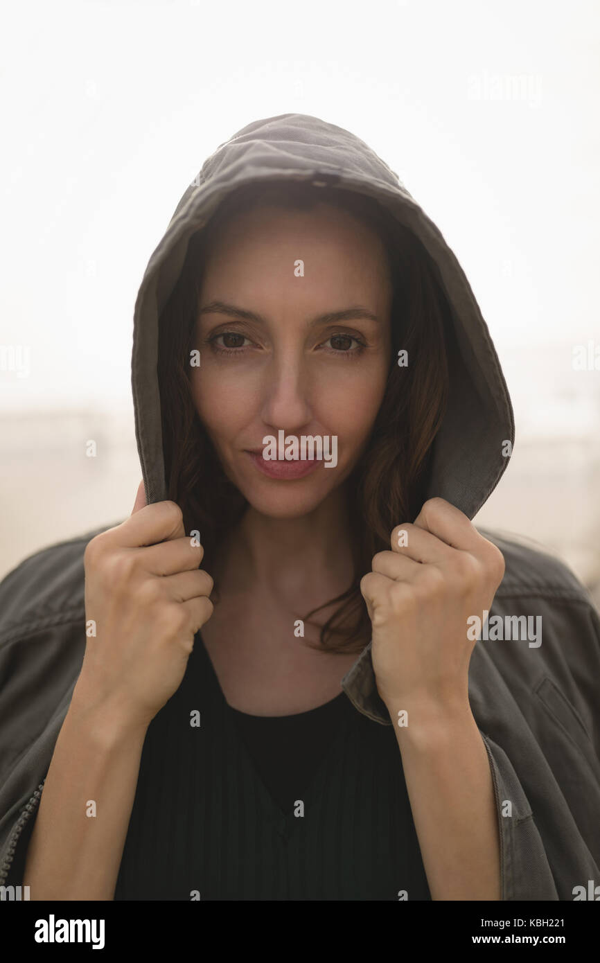 Woman wearing hood hi-res stock photography and images - Alamy