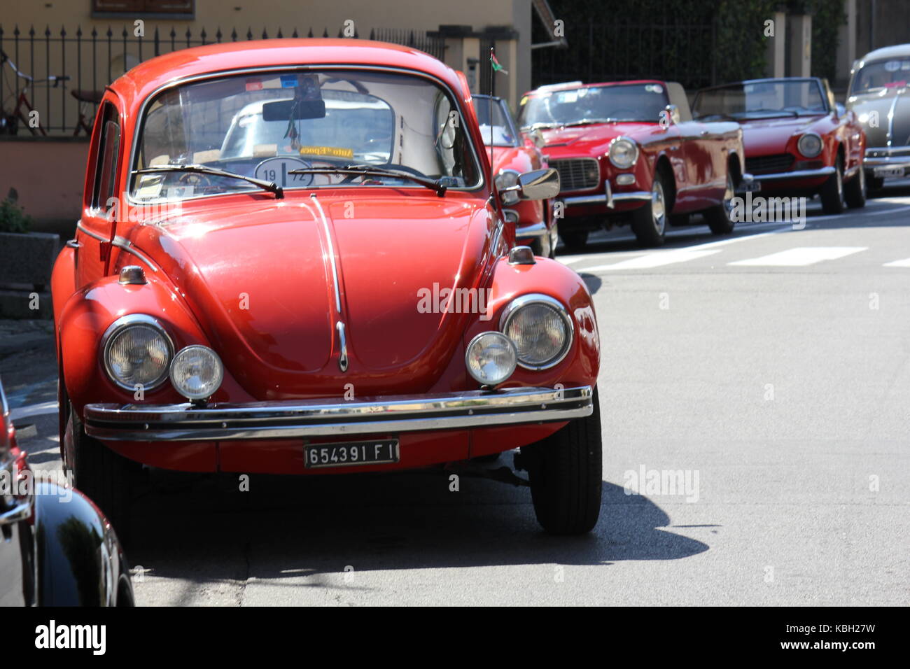 LASTRA A SIGNA, ITALY - AUGUST 30 2015: Vintage red beetle parked on the street in Lastra a Signa, Florence Stock Photo