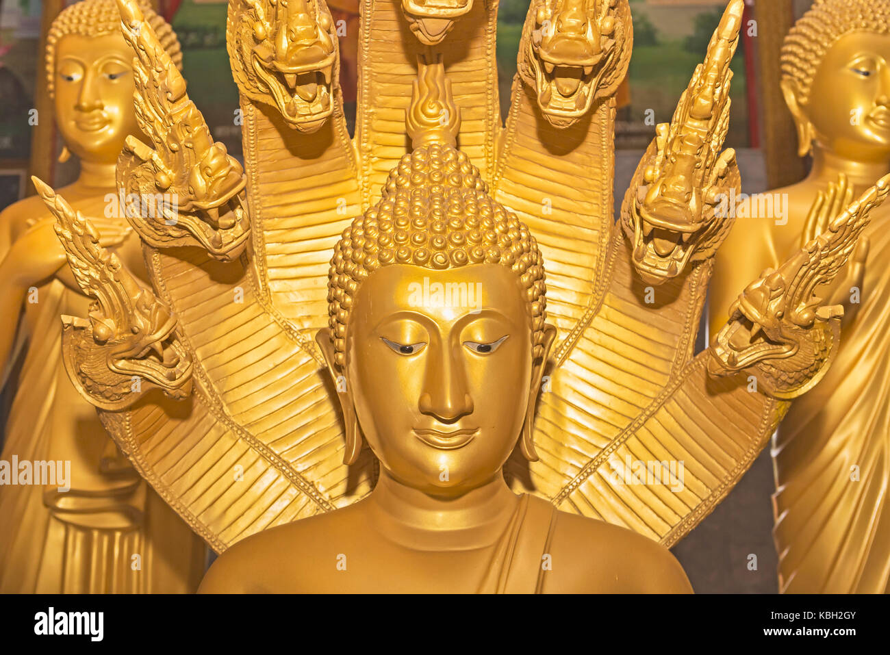 Phuket, Thailand July 4, 2017 : Portrait of a golden Buddha statue located in the interior of Wat Chalong temple also called big Chedi is located in t Stock Photo
