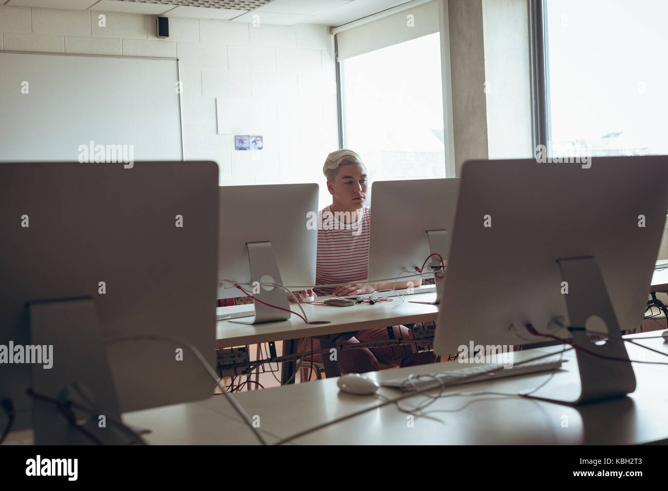 Man working on personal computer in office Stock Photo - Alamy