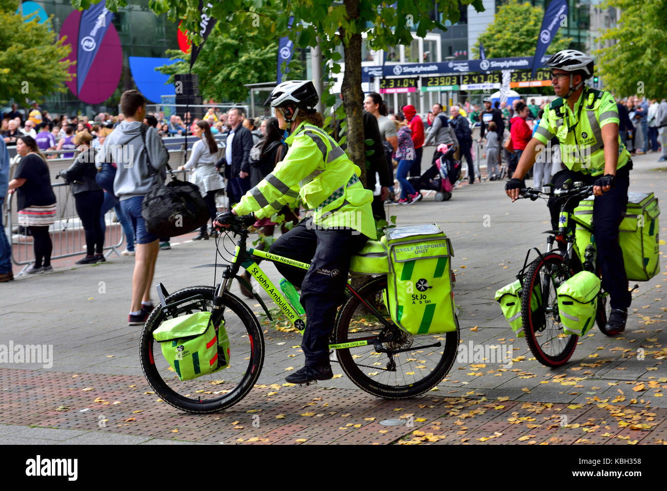 St John ambulance bicycle response personnel at event Stock Photo