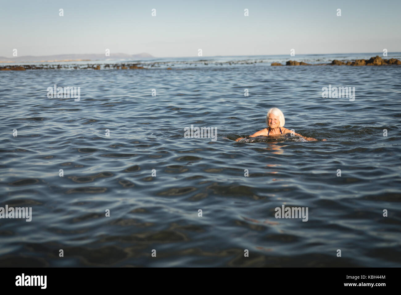 Elderly woman swimming hi-res stock photography and images - Alamy