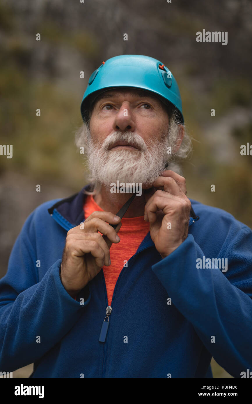 Man wearing protective helmet hi-res stock photography and images - Alamy